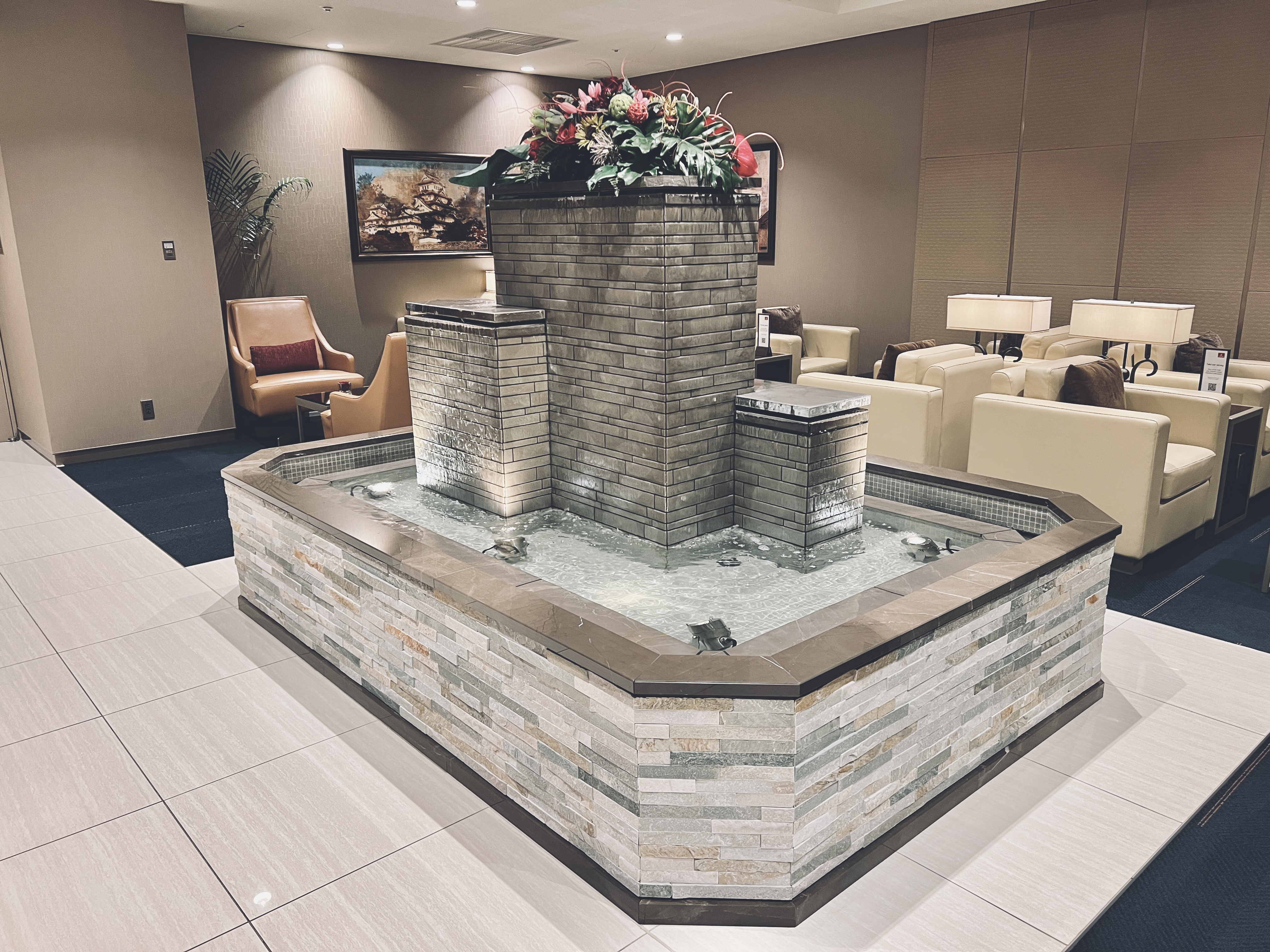 The Emirates Lounge Narita NRT water fountain The Emirates Lounge Narita NRT water fountain