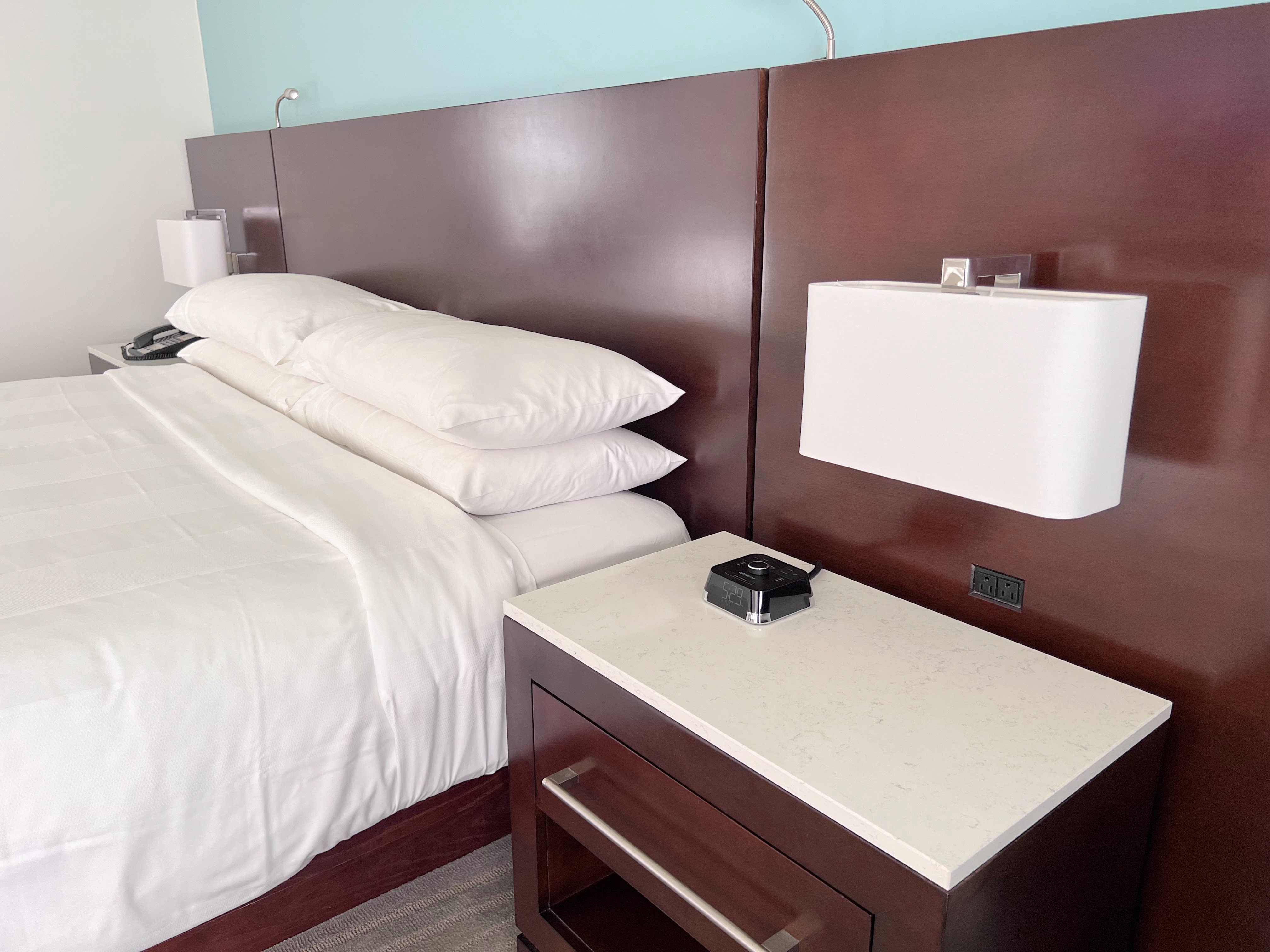 Bed and nightstand at Aruba Marriott Resort Bed and nightstand at Aruba Marriott Resort