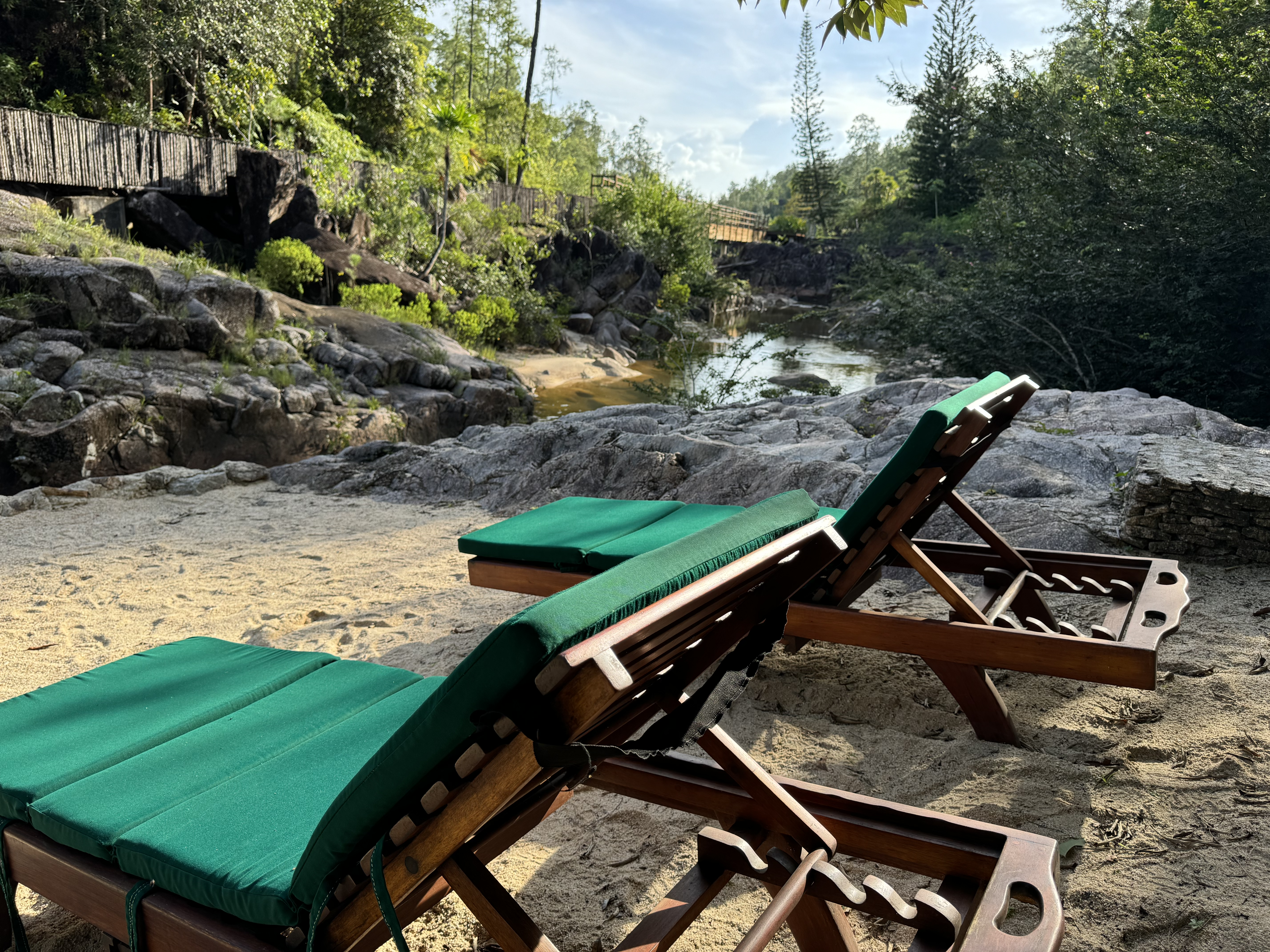 Blancaneaux Lodge Belize Mr Mrs Smith lounge chairs next to river