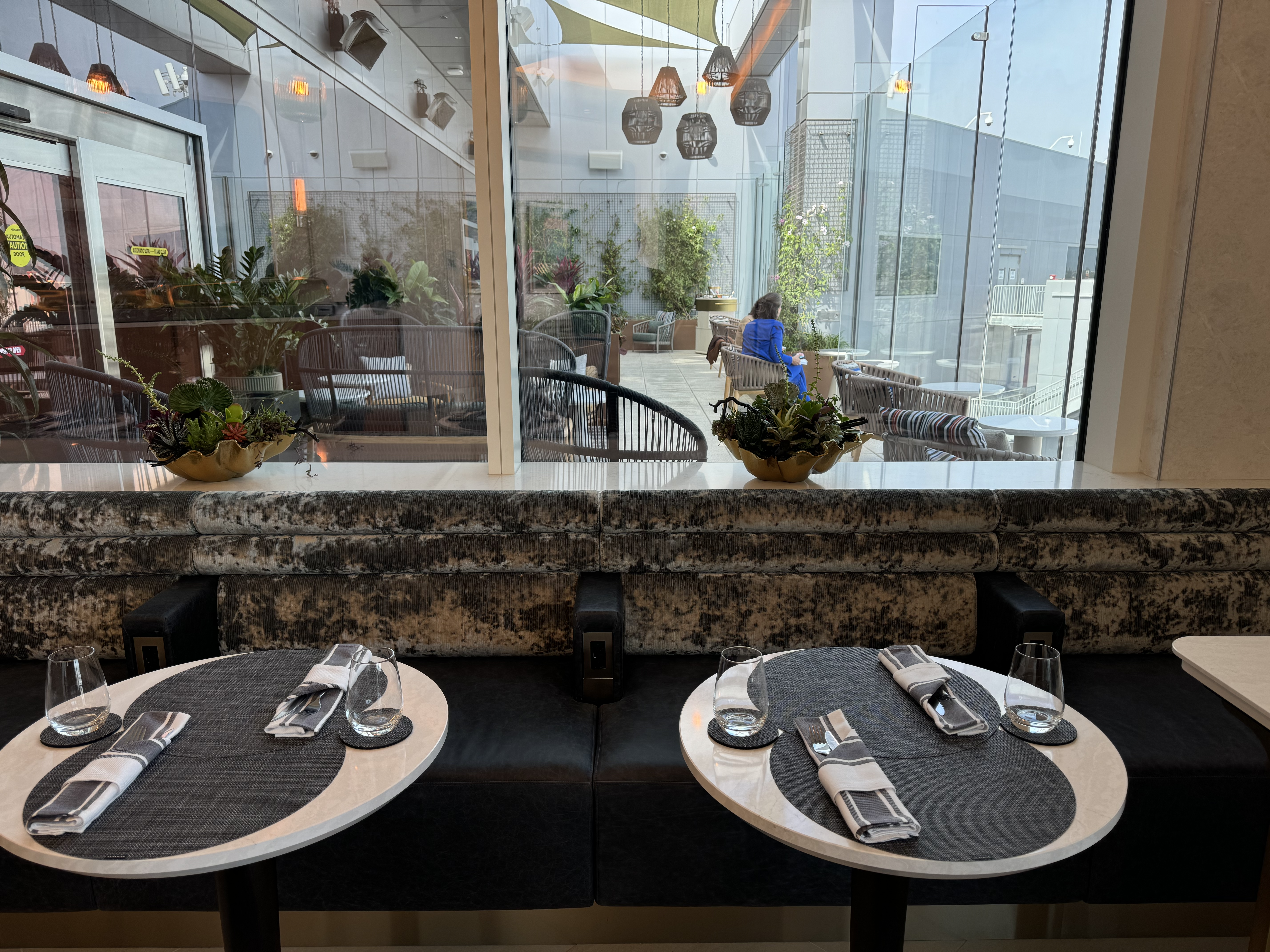 Delta One Lounge LAX Sushi Bar booth seating Delta One Lounge LAX Sushi Bar booth seating
