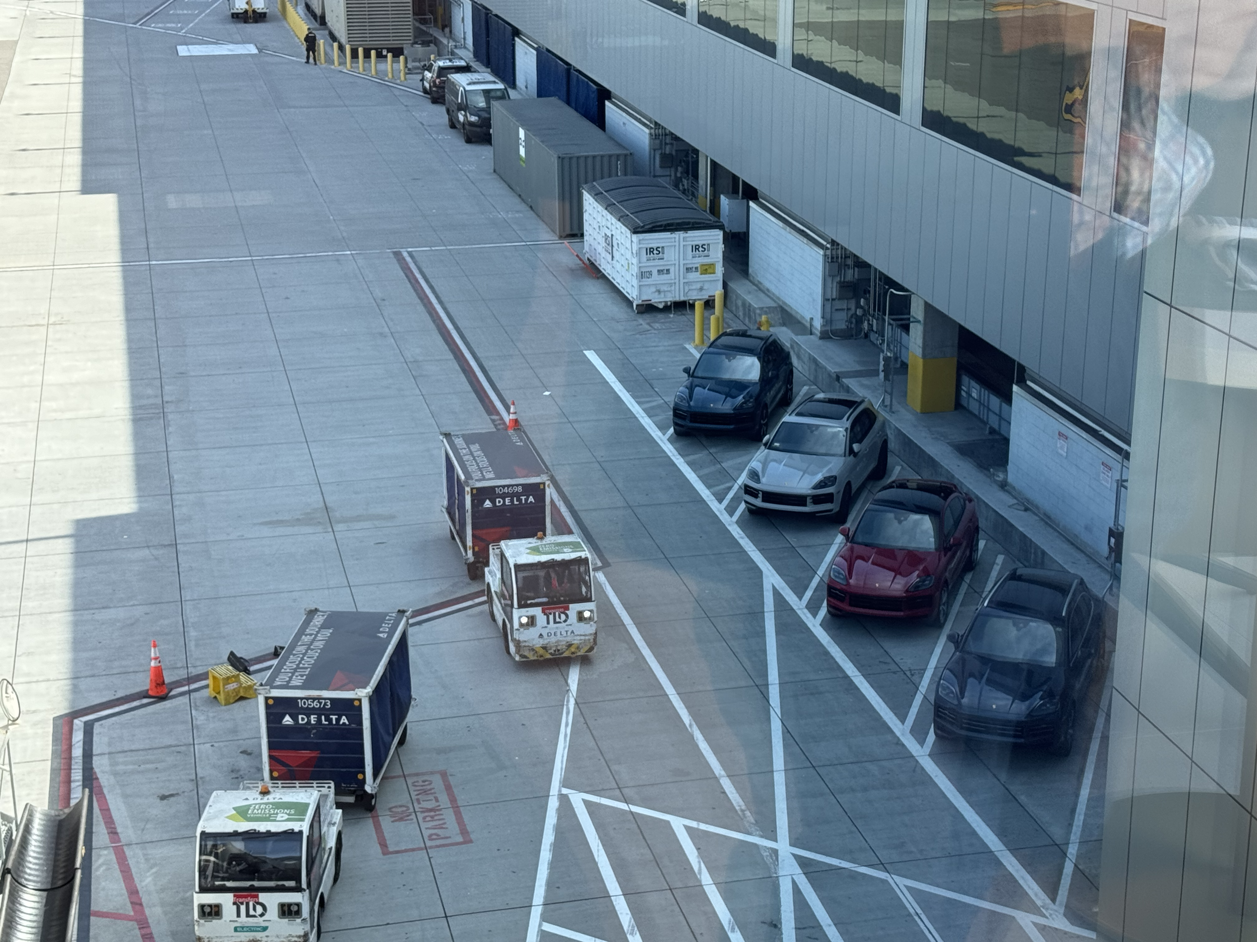 Delta One Lounge LAX Sushi Bar views of Porsche vehicles Delta One Lounge LAX Sushi Bar views of Porsche vehicles