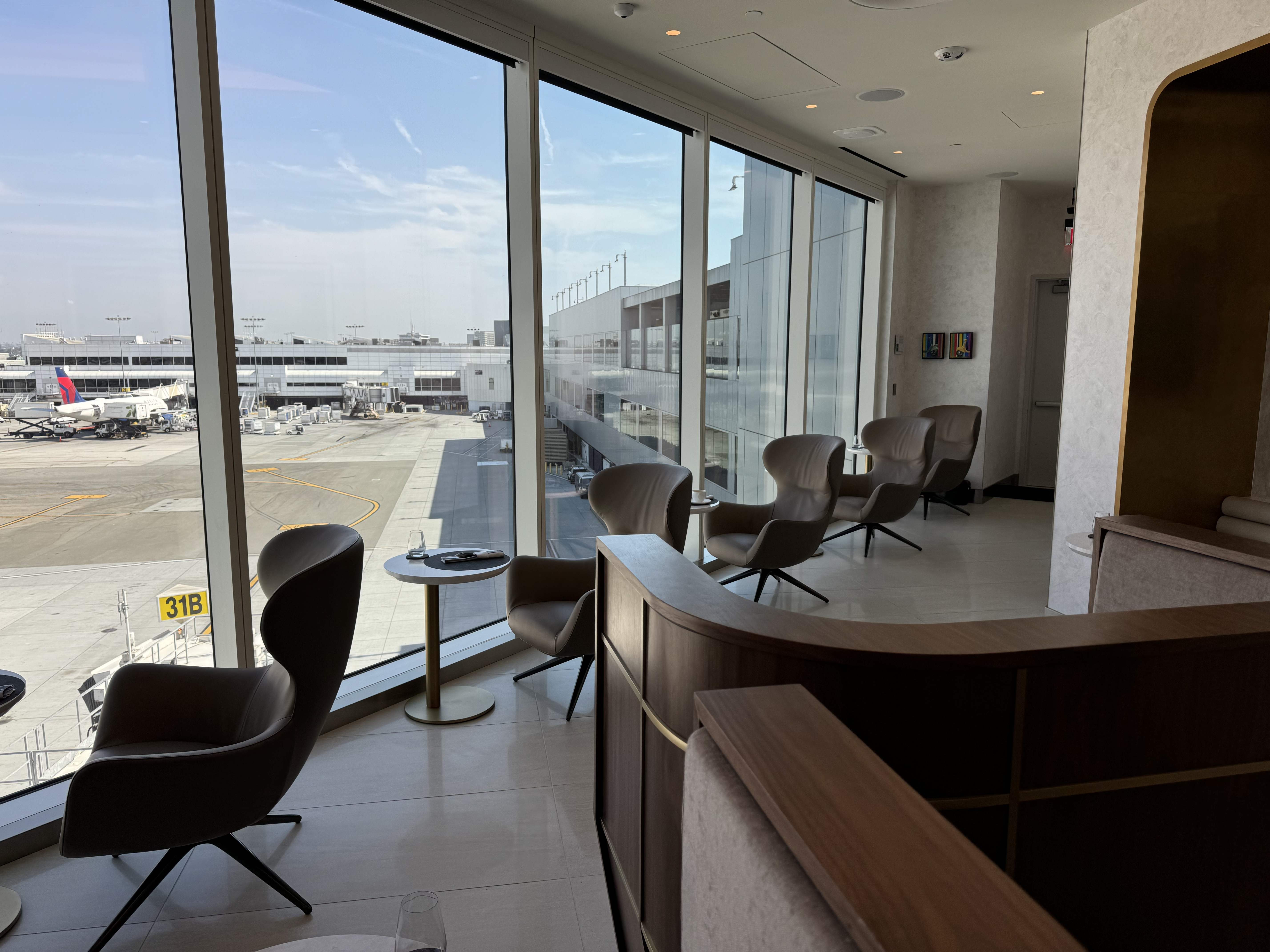 Delta One Lounge LAX Sushi Bar window seating Delta One Lounge LAX Sushi Bar window seating