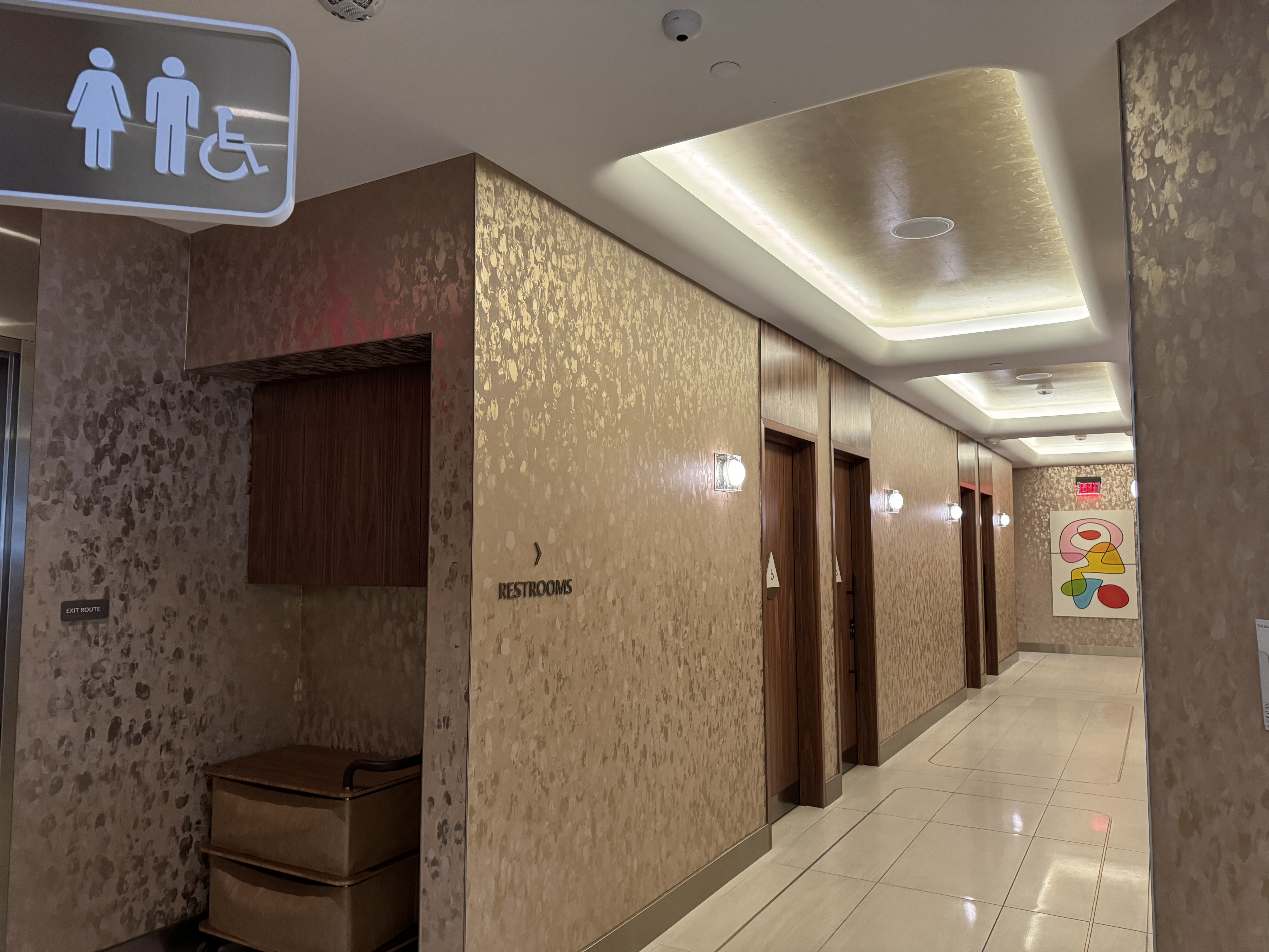 Delta One Lounge LAX restrooms hallway Delta One Lounge LAX restrooms hallway