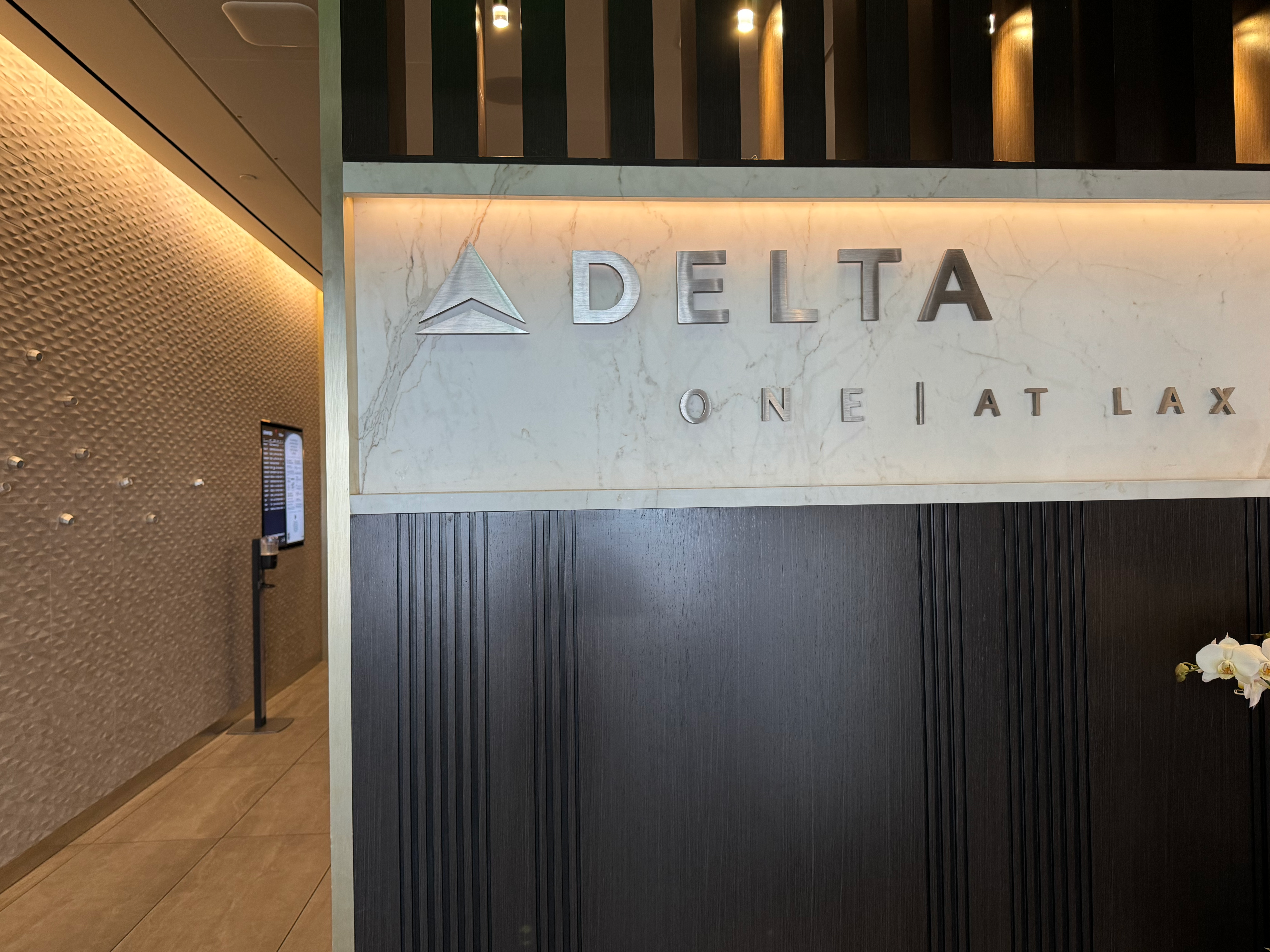 Delta One Lounge LAX sign inside door Delta One Lounge LAX sign inside door