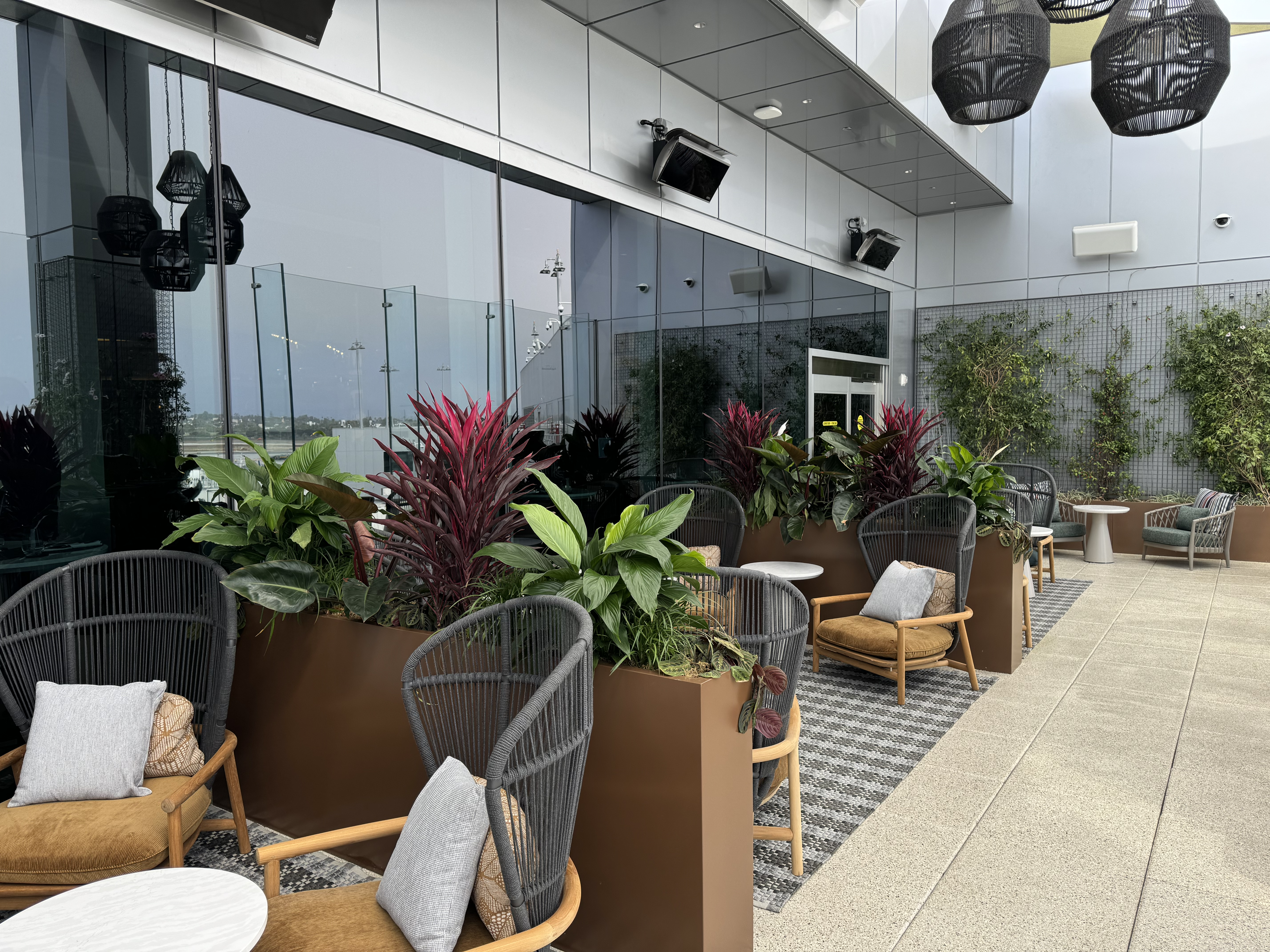 Delta One Lounge LAX terrace group seating Delta One Lounge LAX terrace group seating