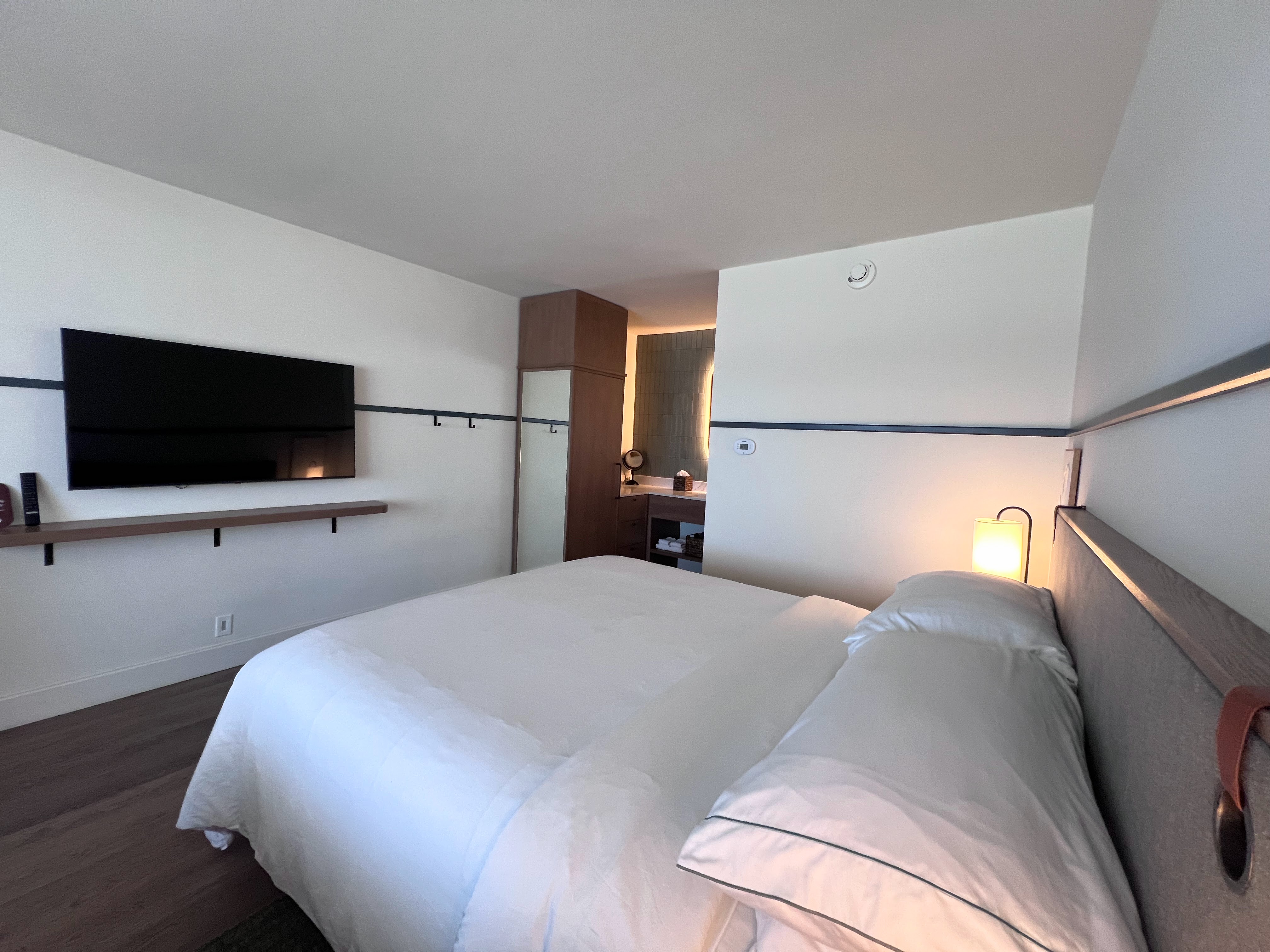 Monterey Beach Hotel guest room bed and TV Monterey Beach Hotel guest room bed and TV
