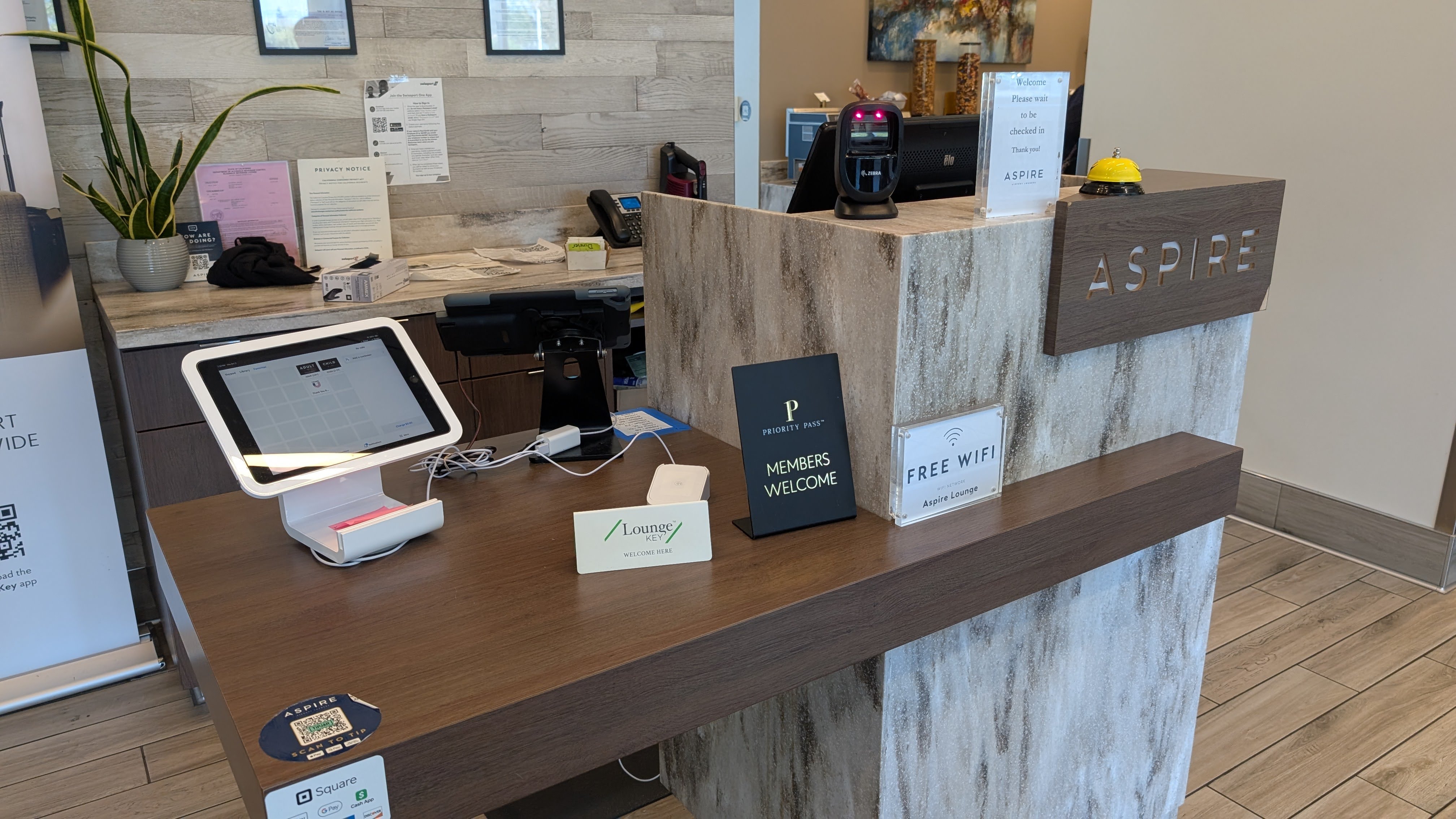 ONT Terminal 2 Aspire Lounge entrance desk ONT Terminal 2 Aspire Lounge entrance desk