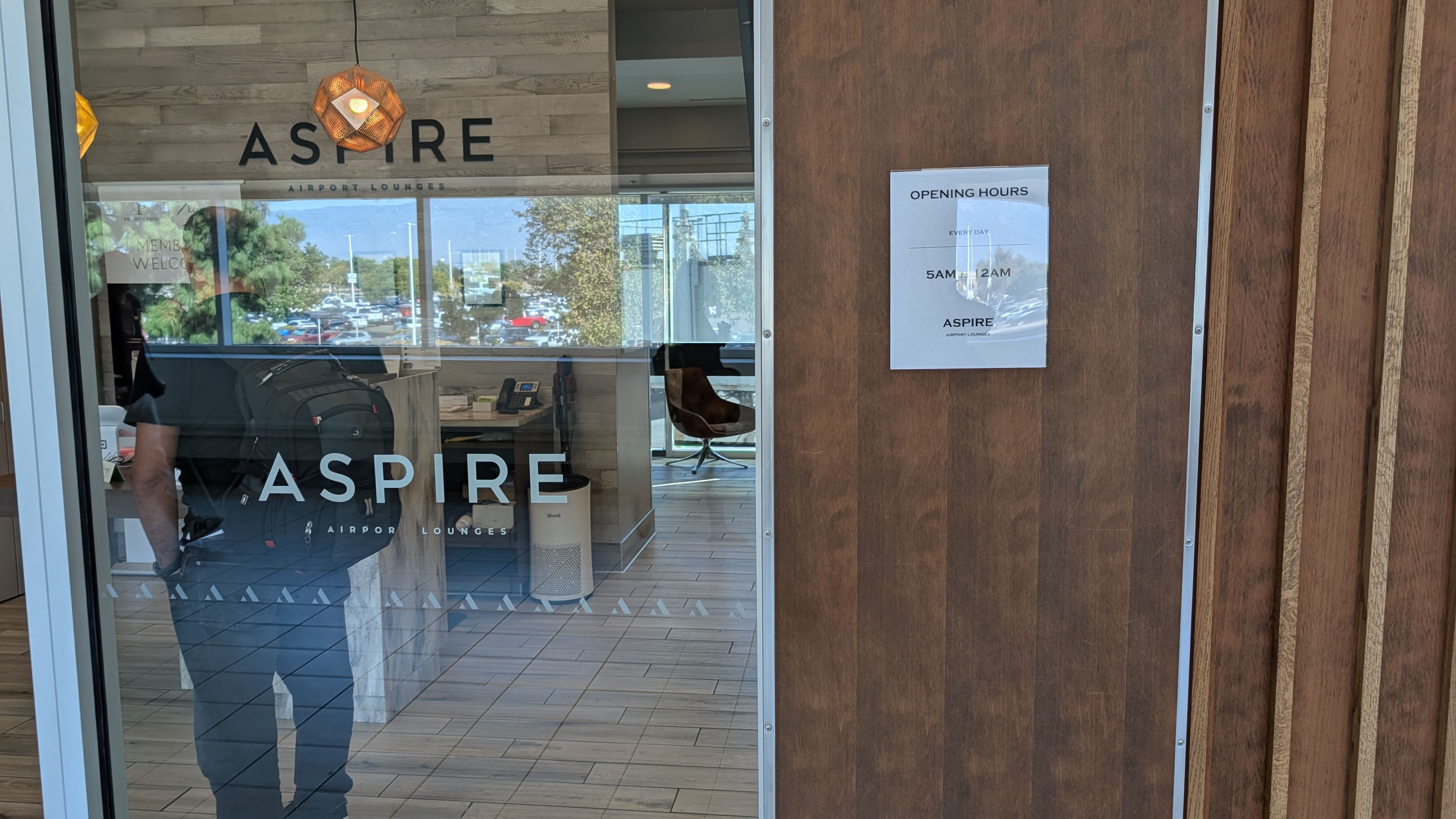 ONT Terminal 2 Aspire Lounge entrance door and hours ONT Terminal 2 Aspire Lounge entrance door and hours