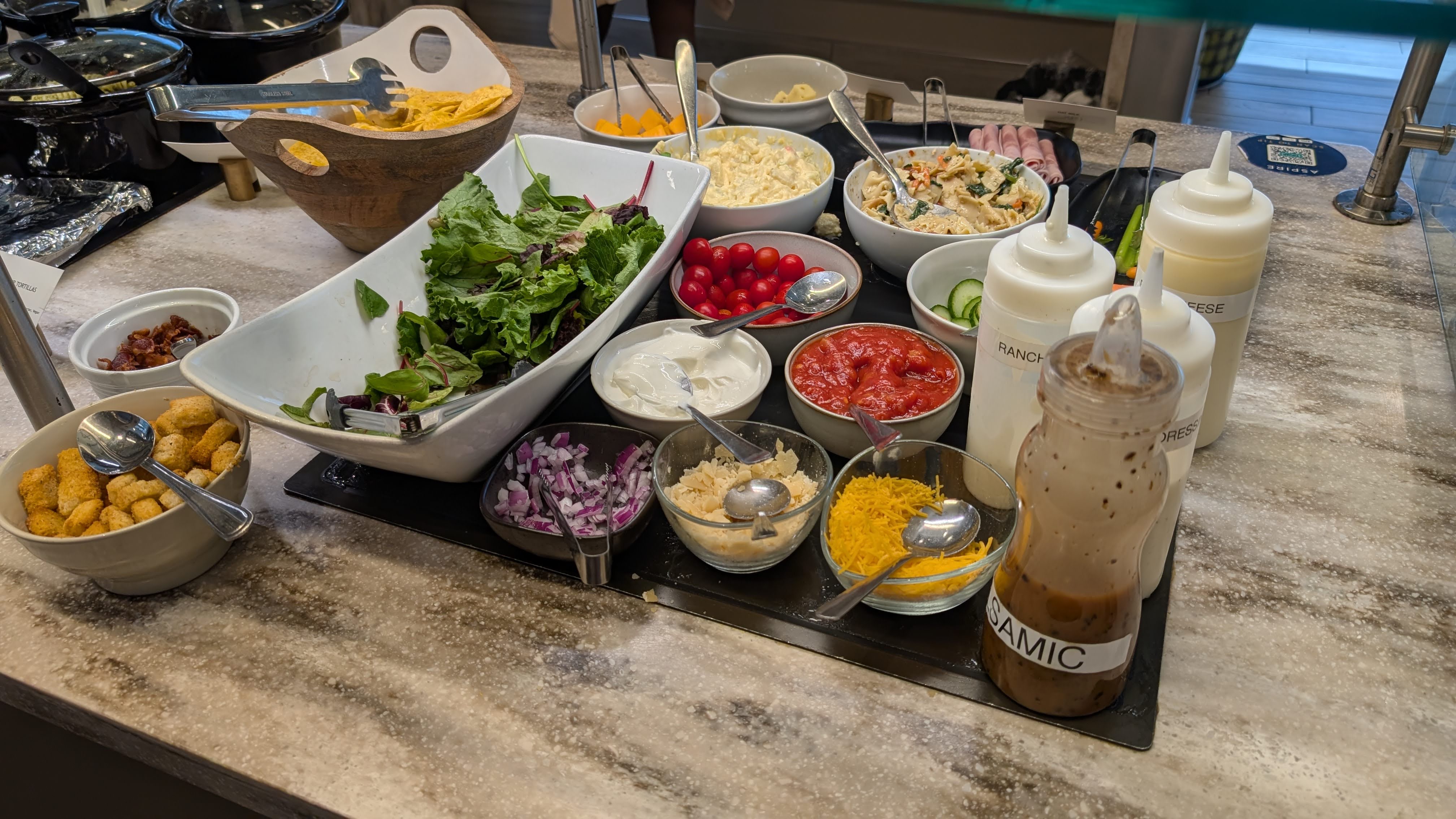 ONT Terminal 2 Aspire Lounge food and beverage salad and toppings ONT Terminal 2 Aspire Lounge food and beverage salad and toppings