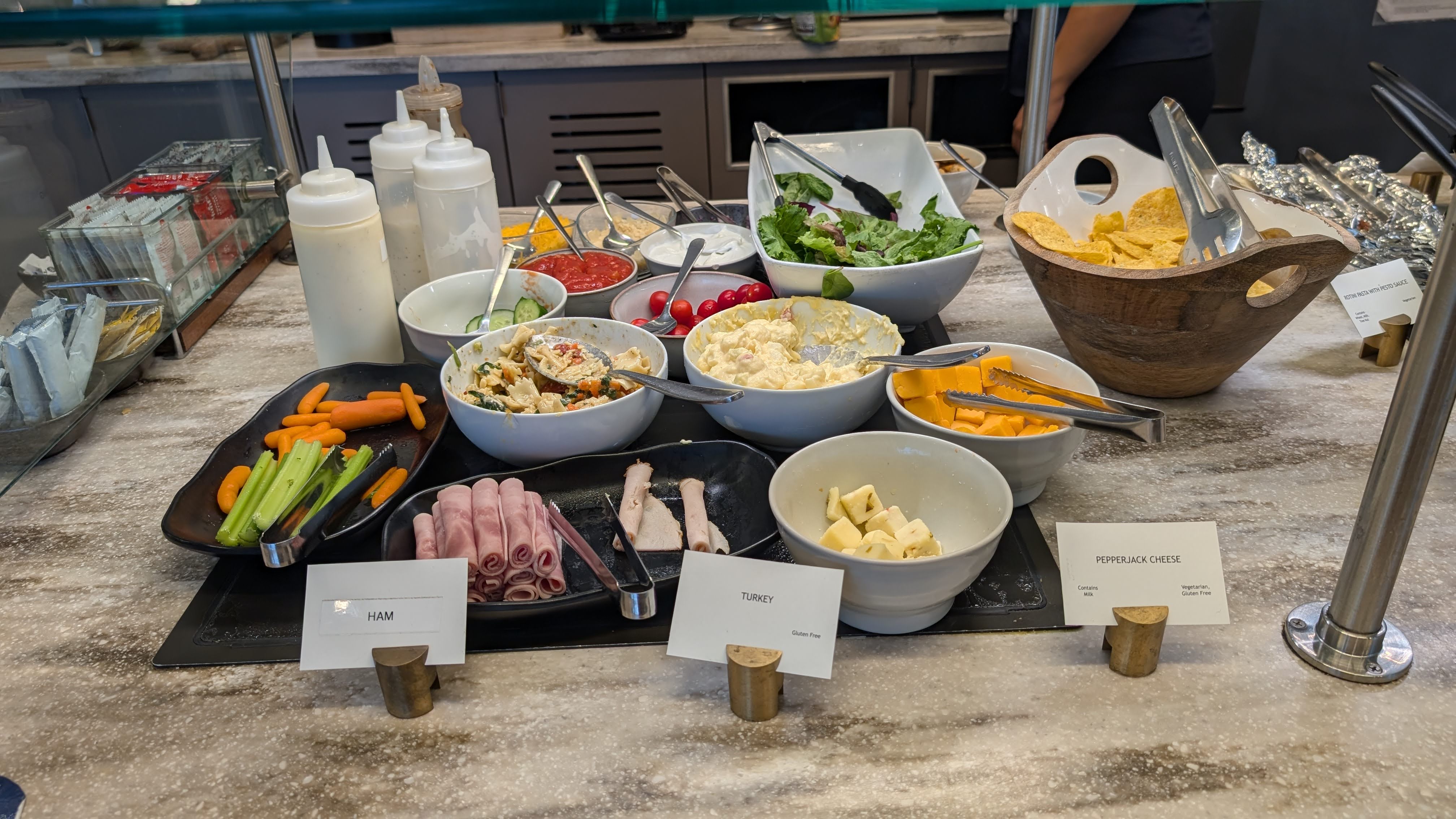 ONT Terminal 2 Aspire Lounge food and beverage salad bar ONT Terminal 2 Aspire Lounge food and beverage salad bar