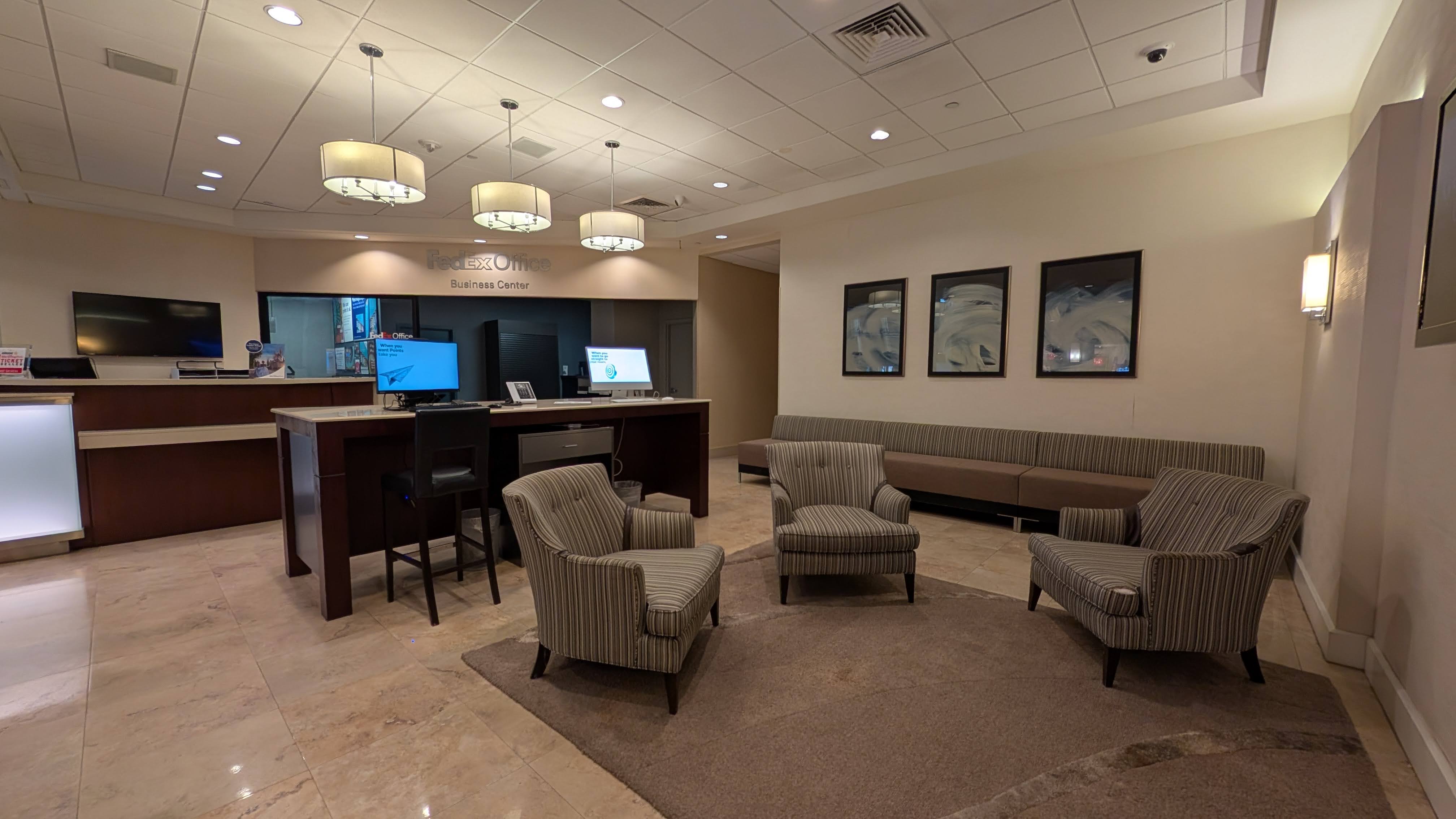Hilton Orlando Lake Buena Vista amenities business center seating and computers Hilton Orlando Lake Buena Vista amenities business center seating and computers