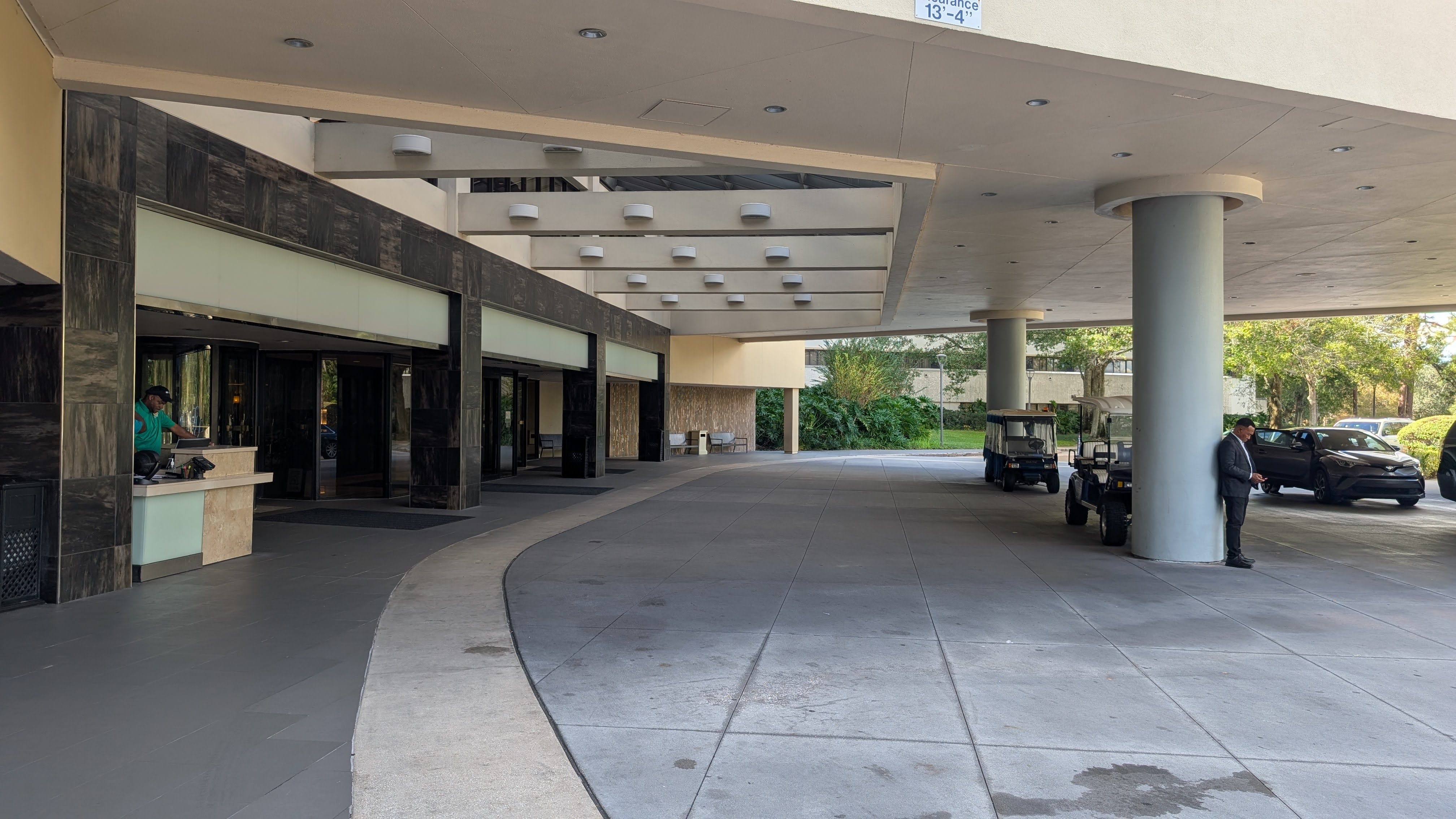 Hilton Orlando Lake Buena Vista amenities parking valet entrance Hilton Orlando Lake Buena Vista amenities parking valet entrance
