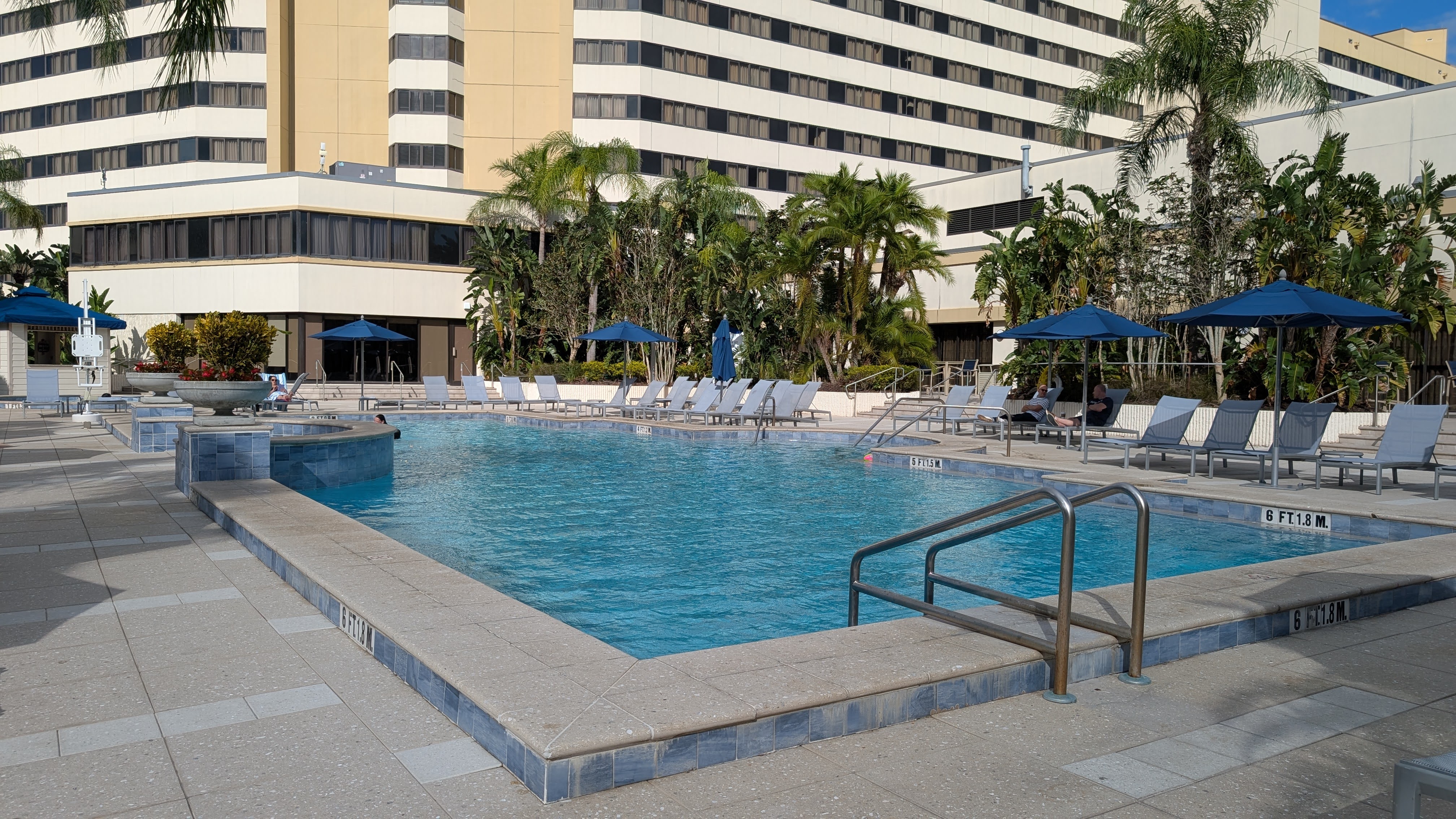 Hilton Orlando Lake Buena Vista amenities pool heated day view Hilton Orlando Lake Buena Vista amenities pool heated day view