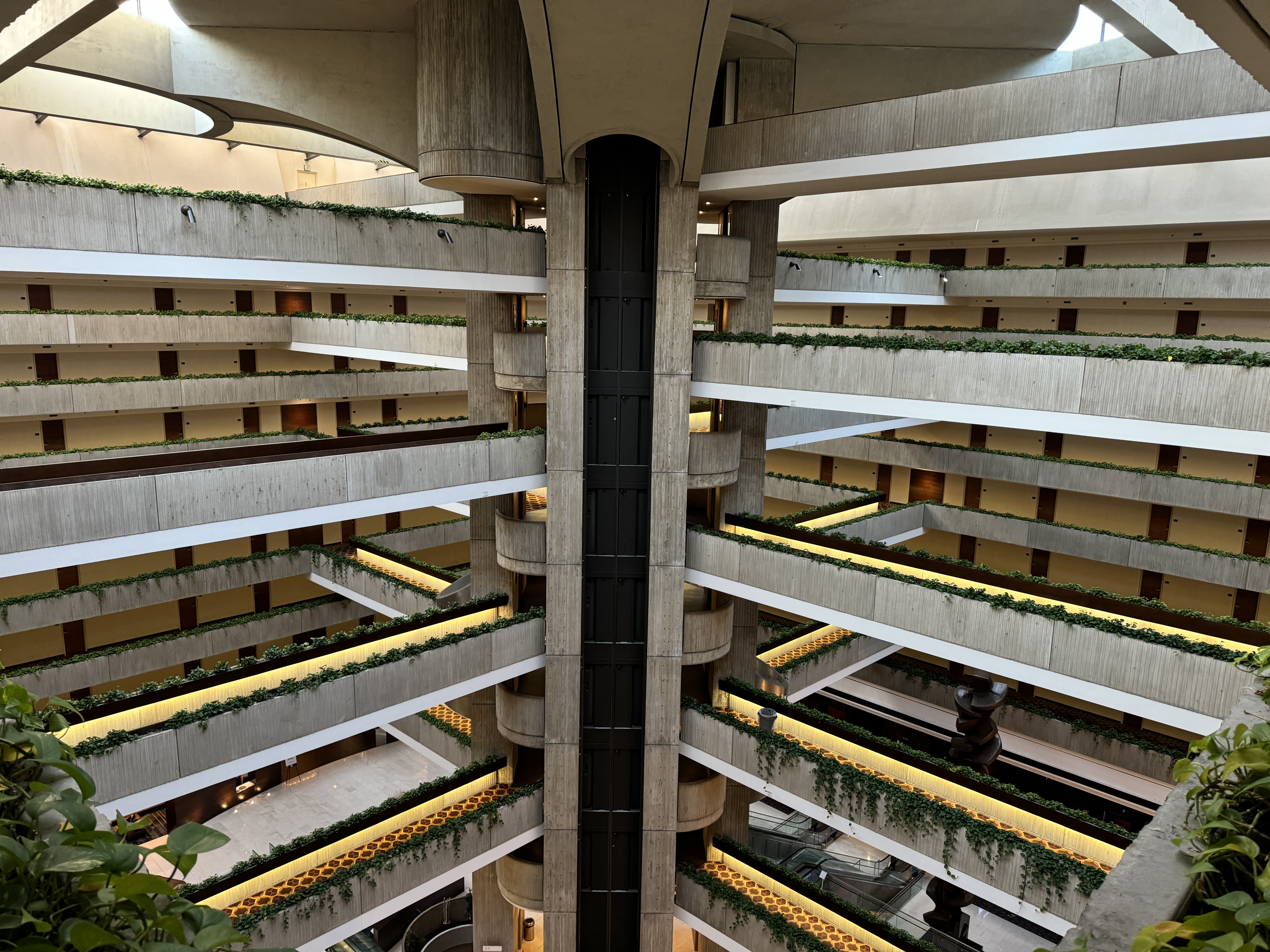 Hyatt Regency OHare Chicago atrium view toward elevator from guest floor Hyatt Regency OHare Chicago atrium view toward elevator from guest floor