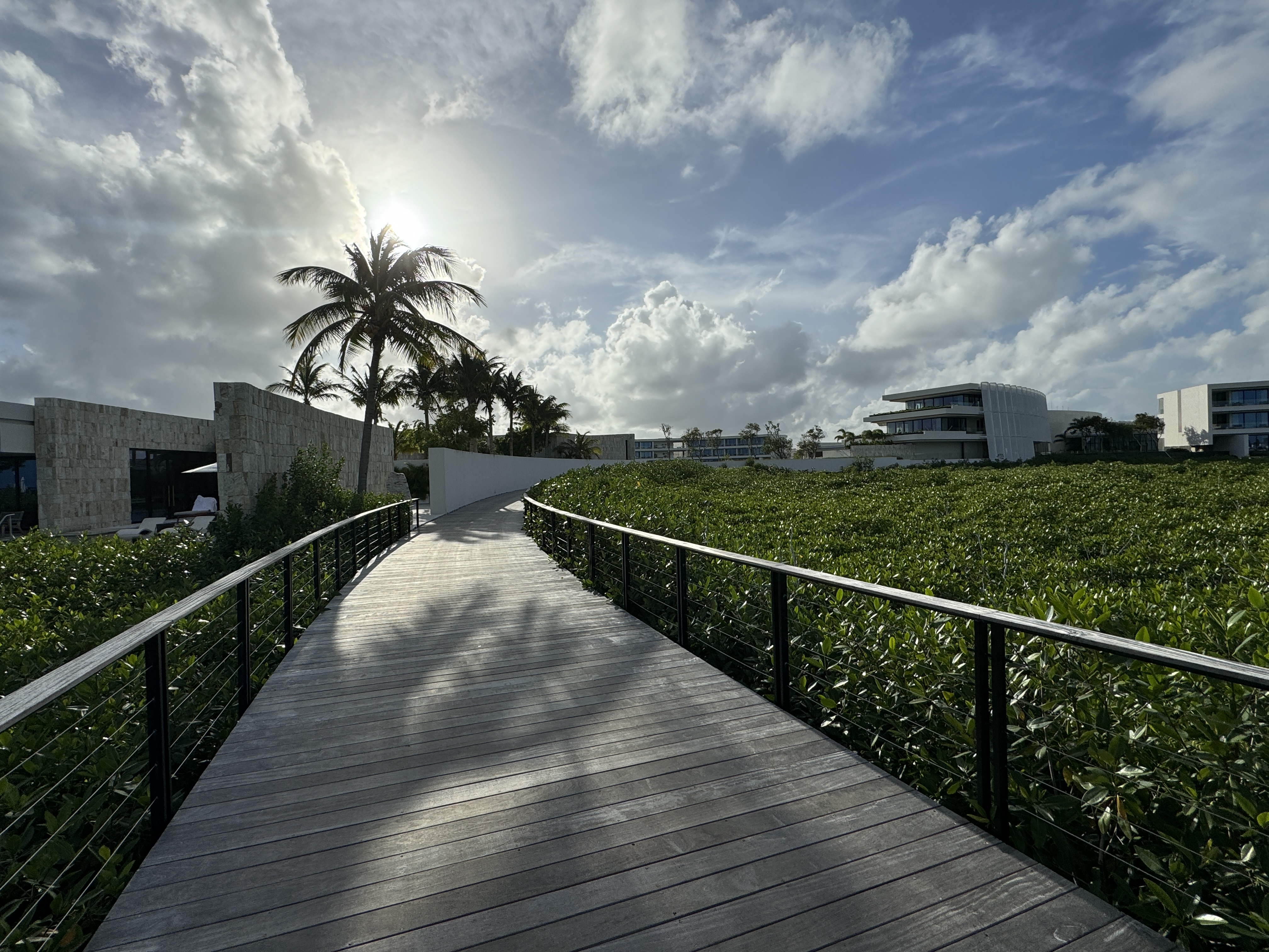 St. Regis Kanai wooden deck walkway St. Regis Kanai wooden deck walkway
