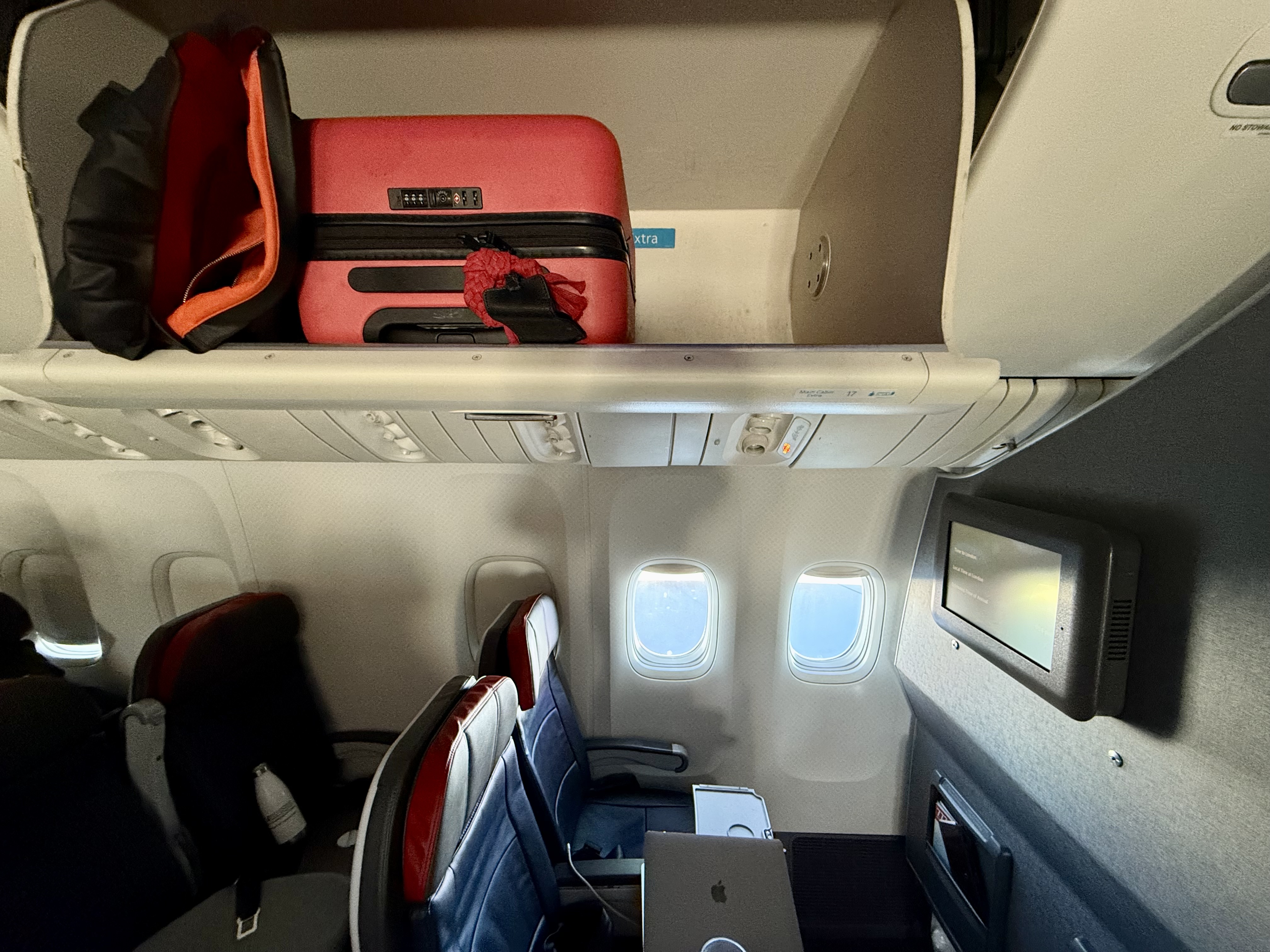 American Airlines economy Boeing 777 overhead bin space American Airlines economy Boeing 777 overhead bin space