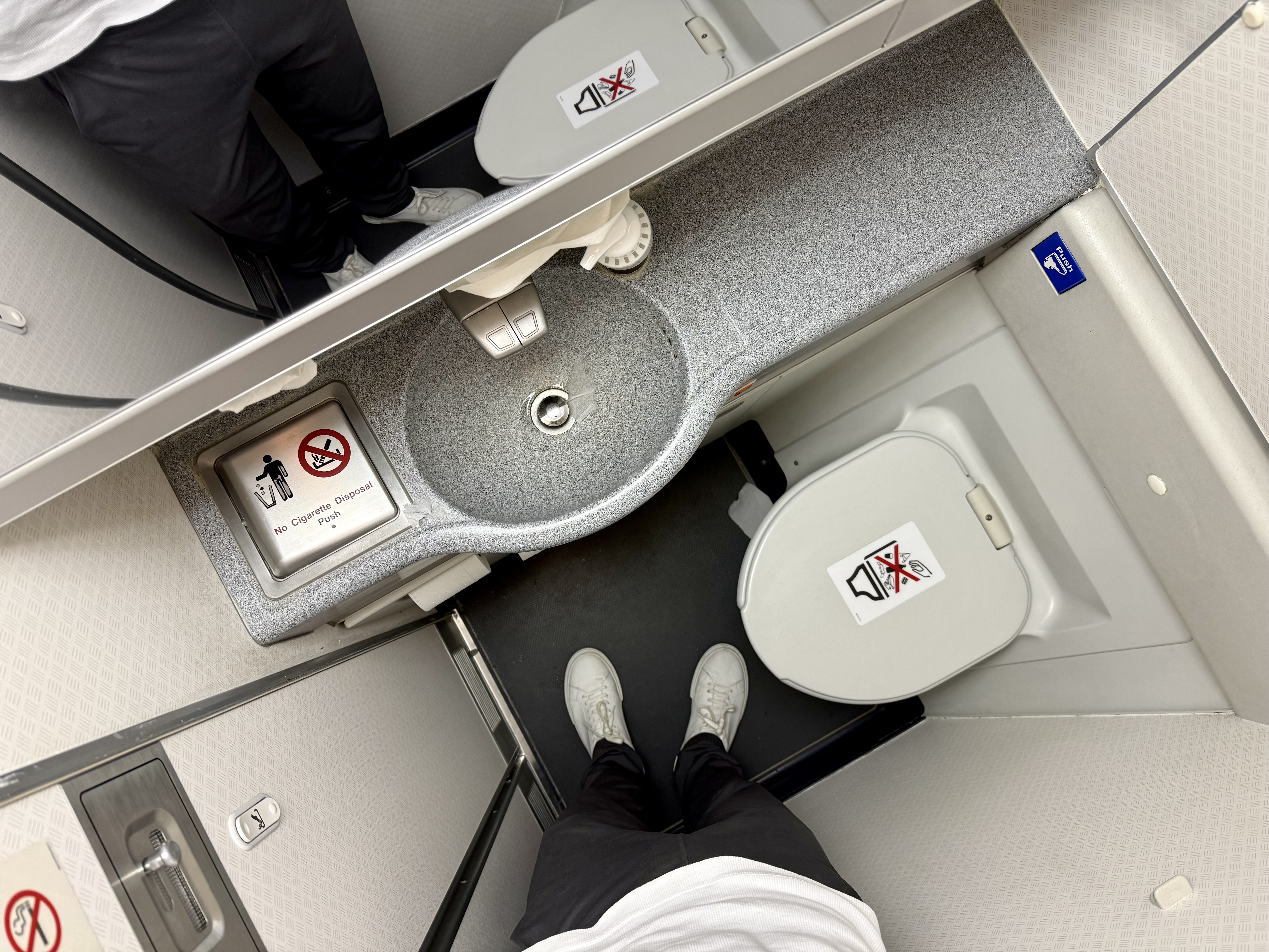 American Airlines economy bathroom from above Boeing 777 American Airlines economy bathroom from above Boeing 777