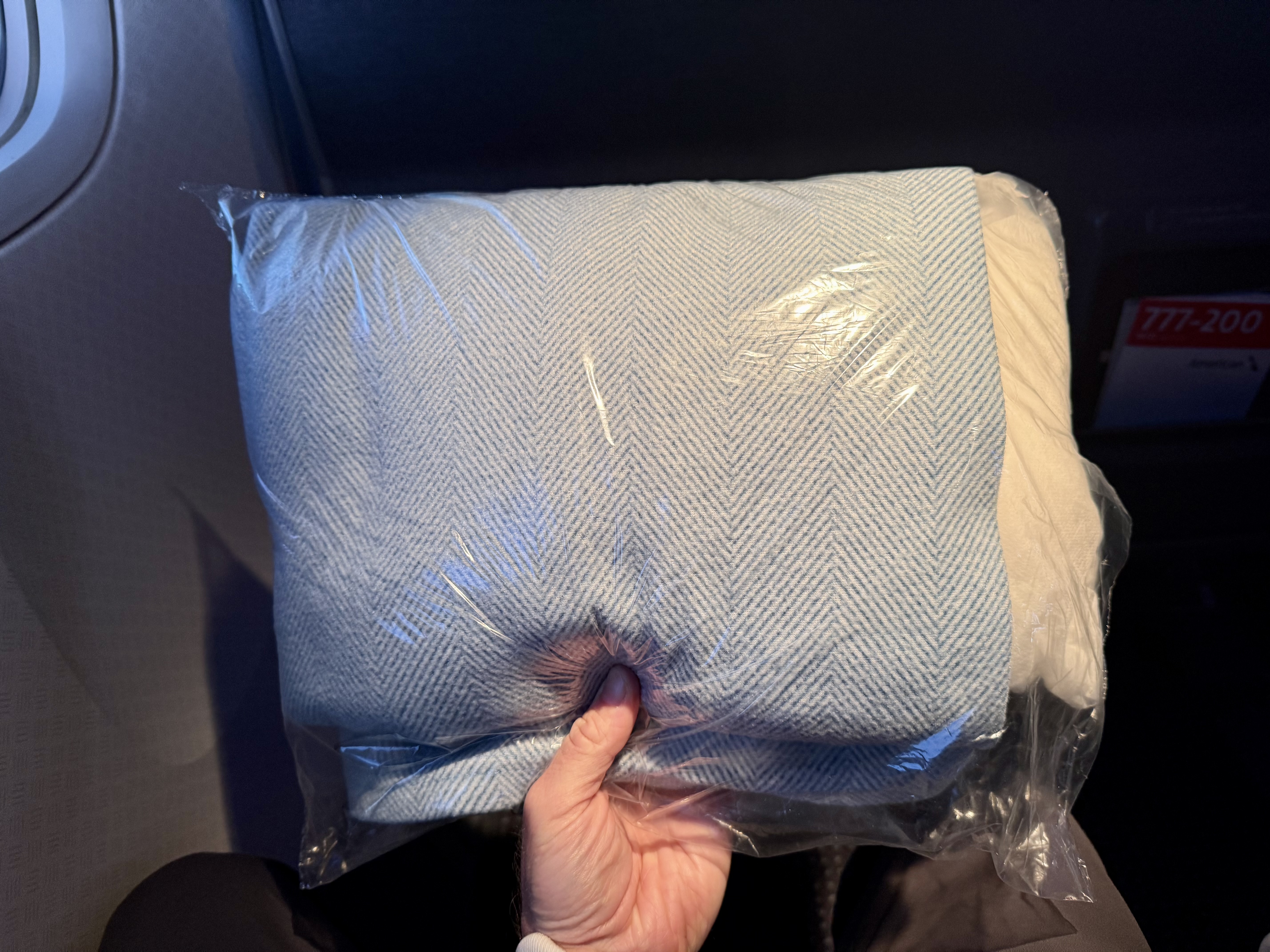 American Airlines economy pillow and blanket in plastic American Airlines economy pillow and blanket in plastic