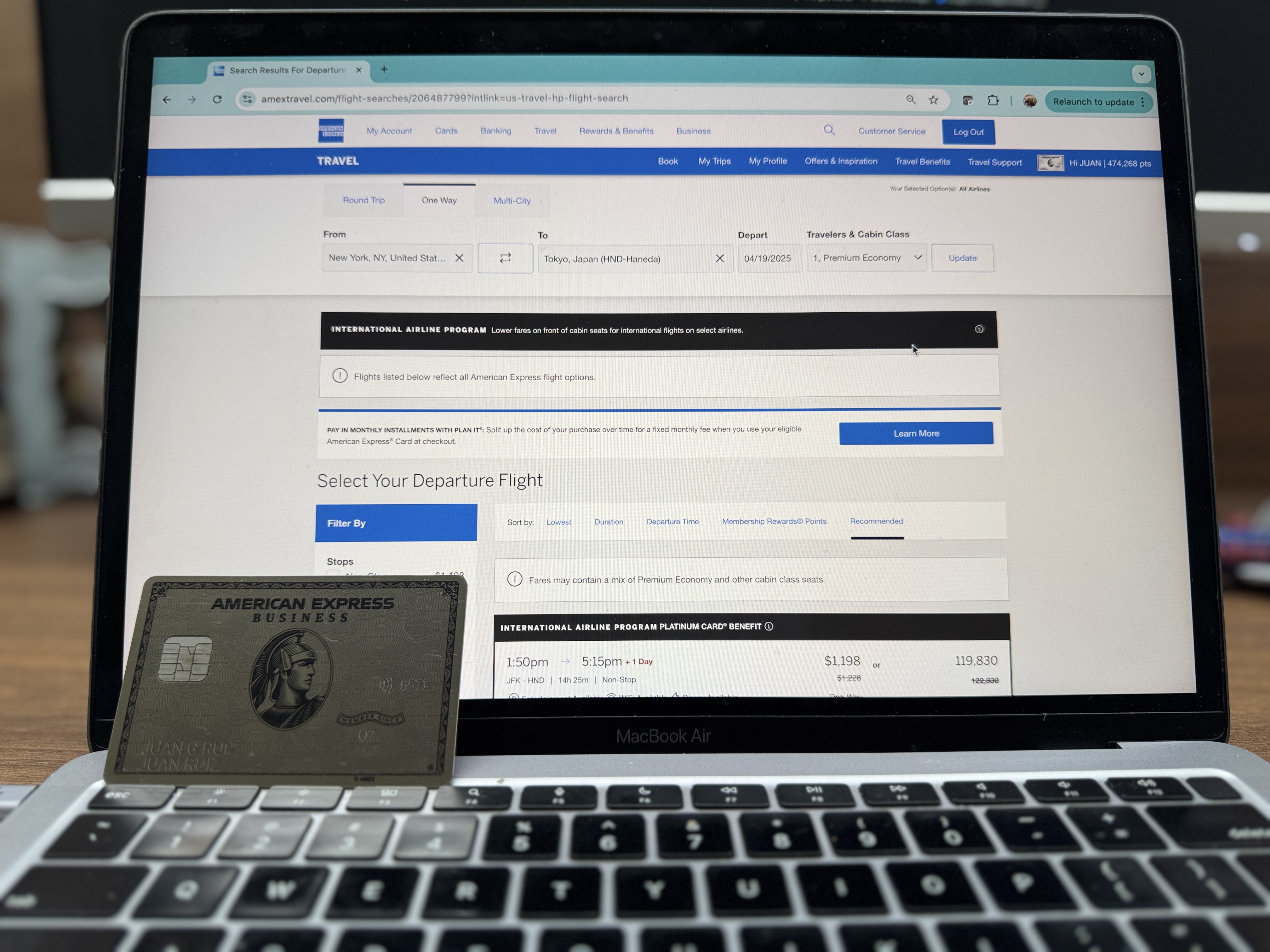 Amex Business Platinum Purchase Flights Laptop Amex Business Platinum in front of a laptop