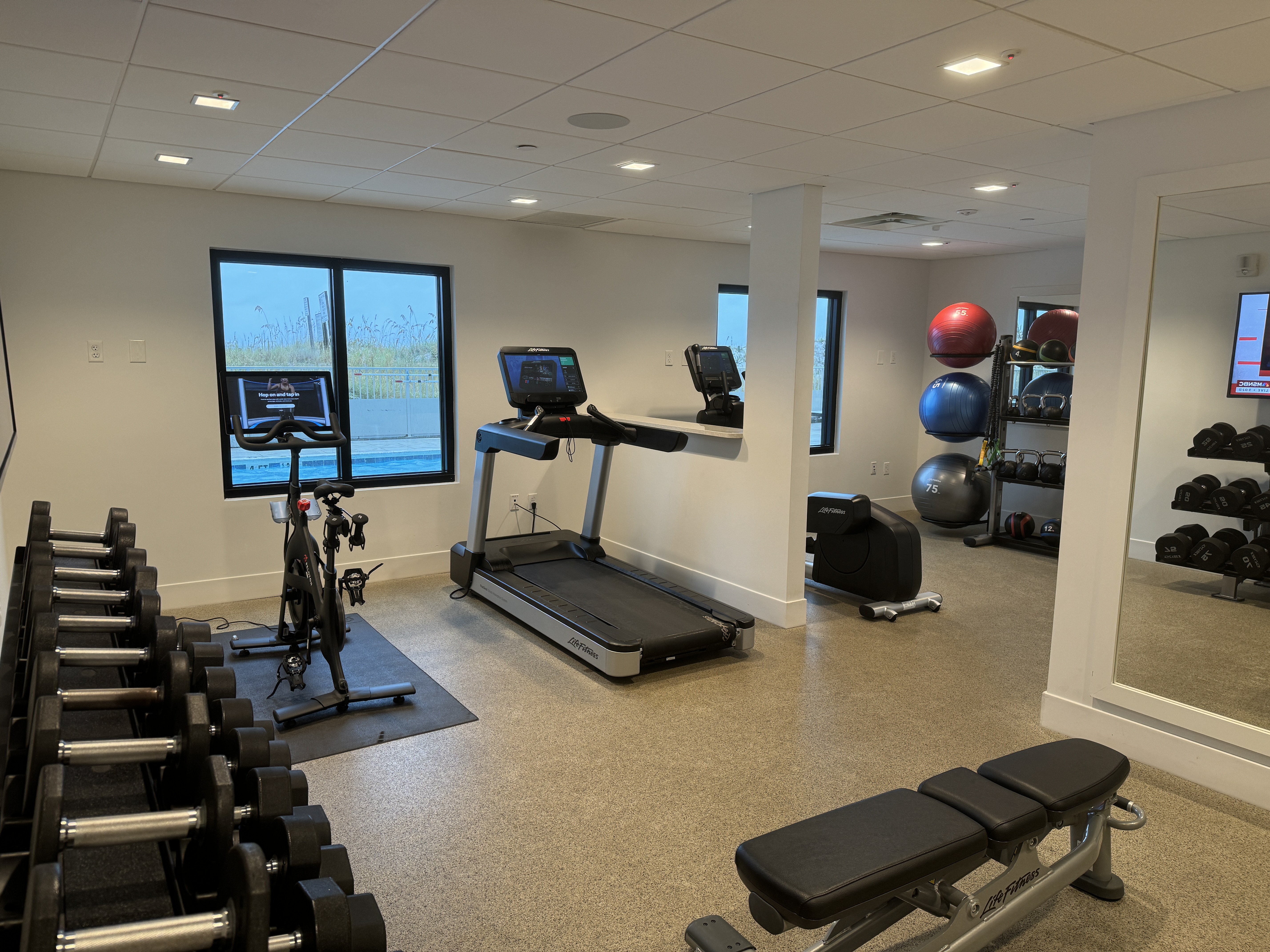 Beal House Fort Walton Beachfront, Tapestry Collection by Hilton Fitness Center.