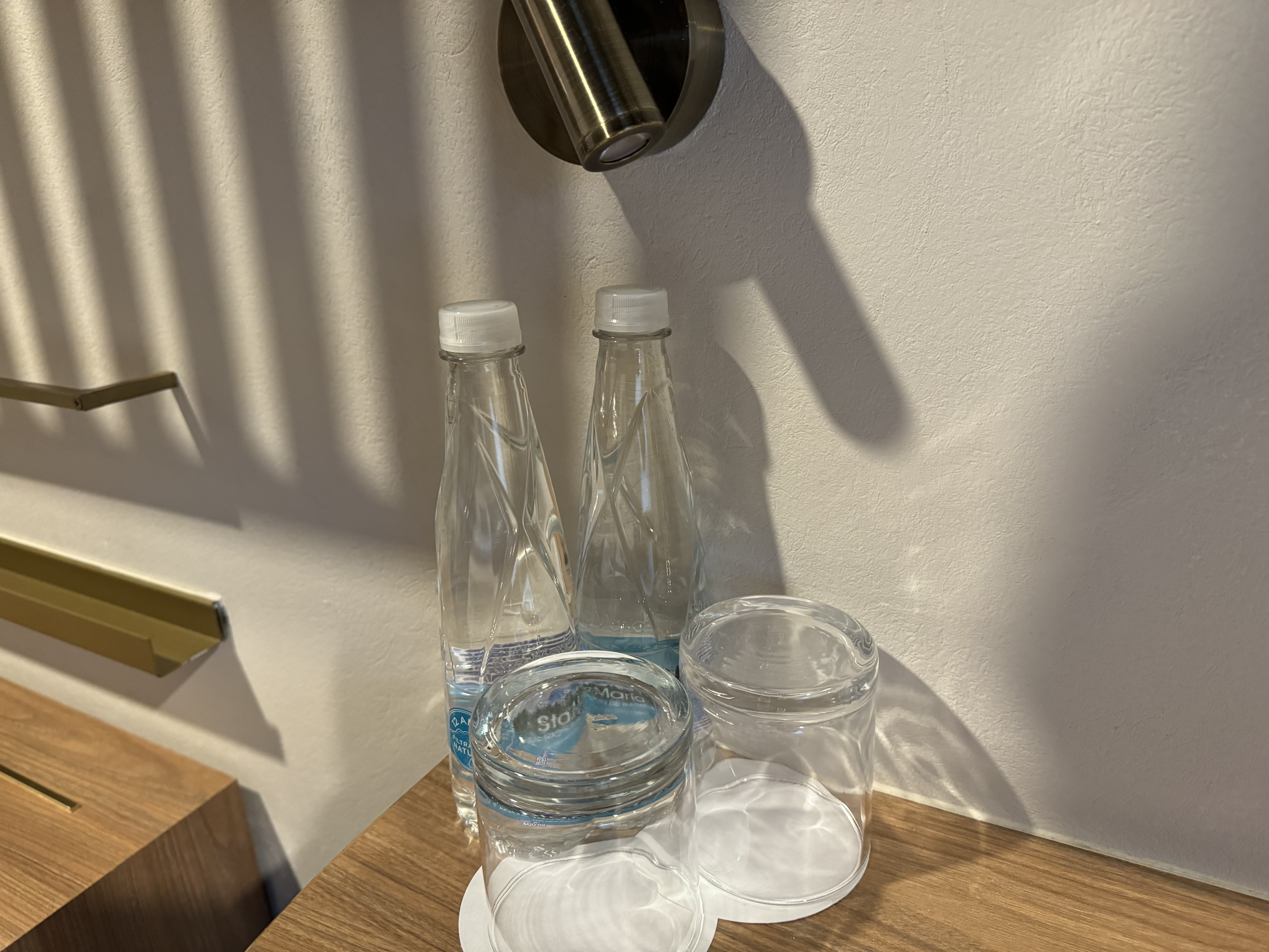 City Centro by Marriott Oaxaca bedroom water on desk City Centro by Marriott Oaxaca bedroom water on desk
