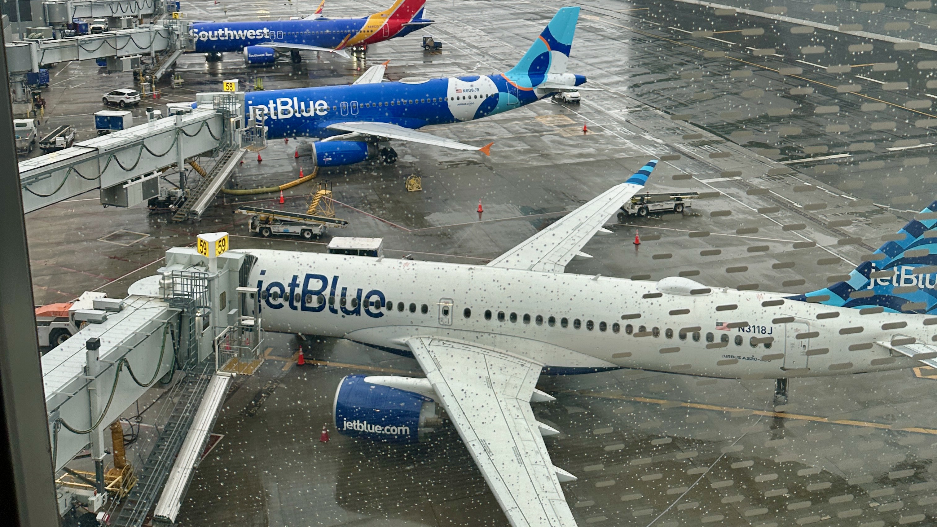 JetBlue Airplanes at the gate in LaGuardia JetBlue Airplanes at the gate in LaGuardia