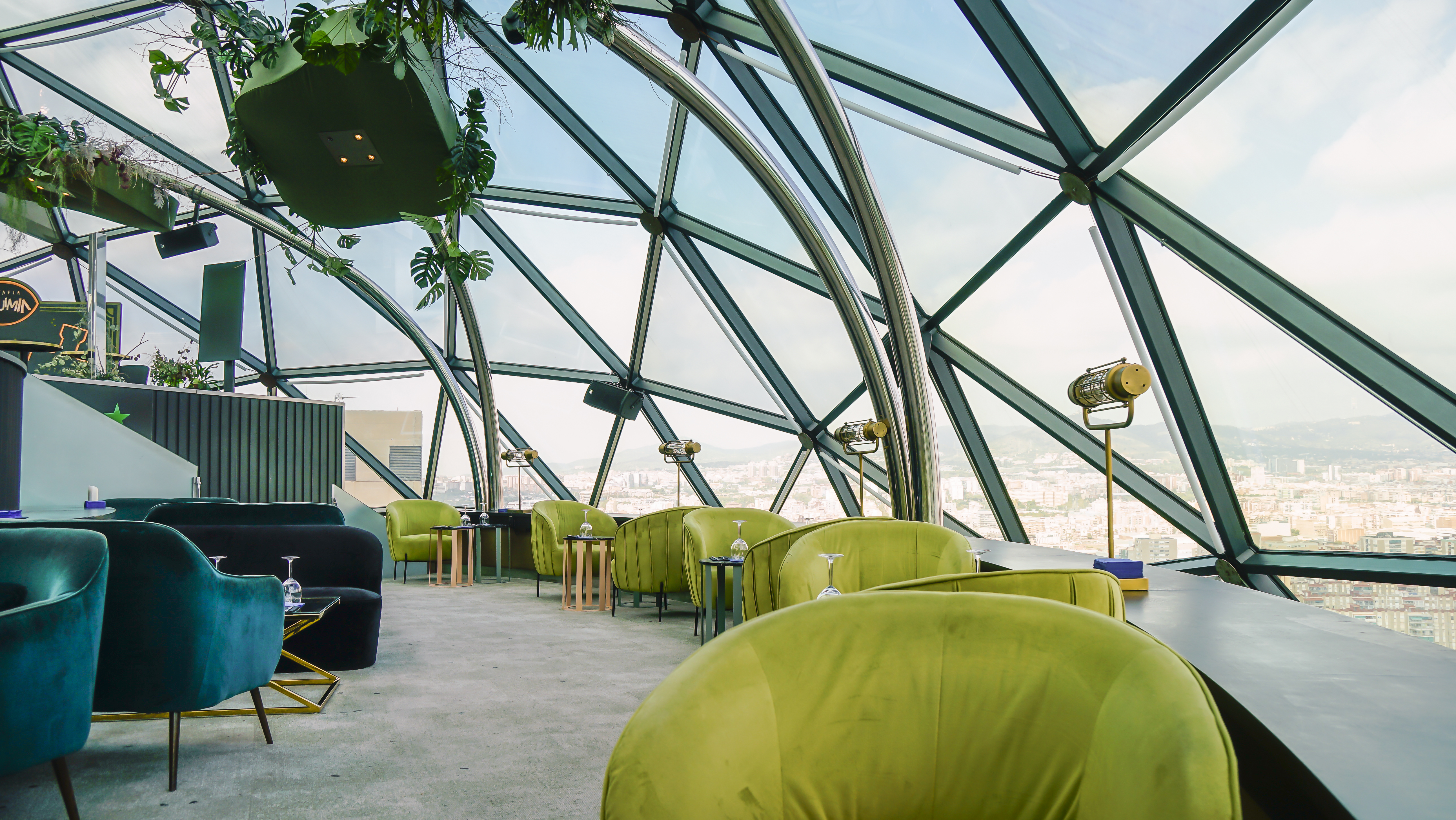 Hyatt Regency Barcelona Tower seating in glass dome
