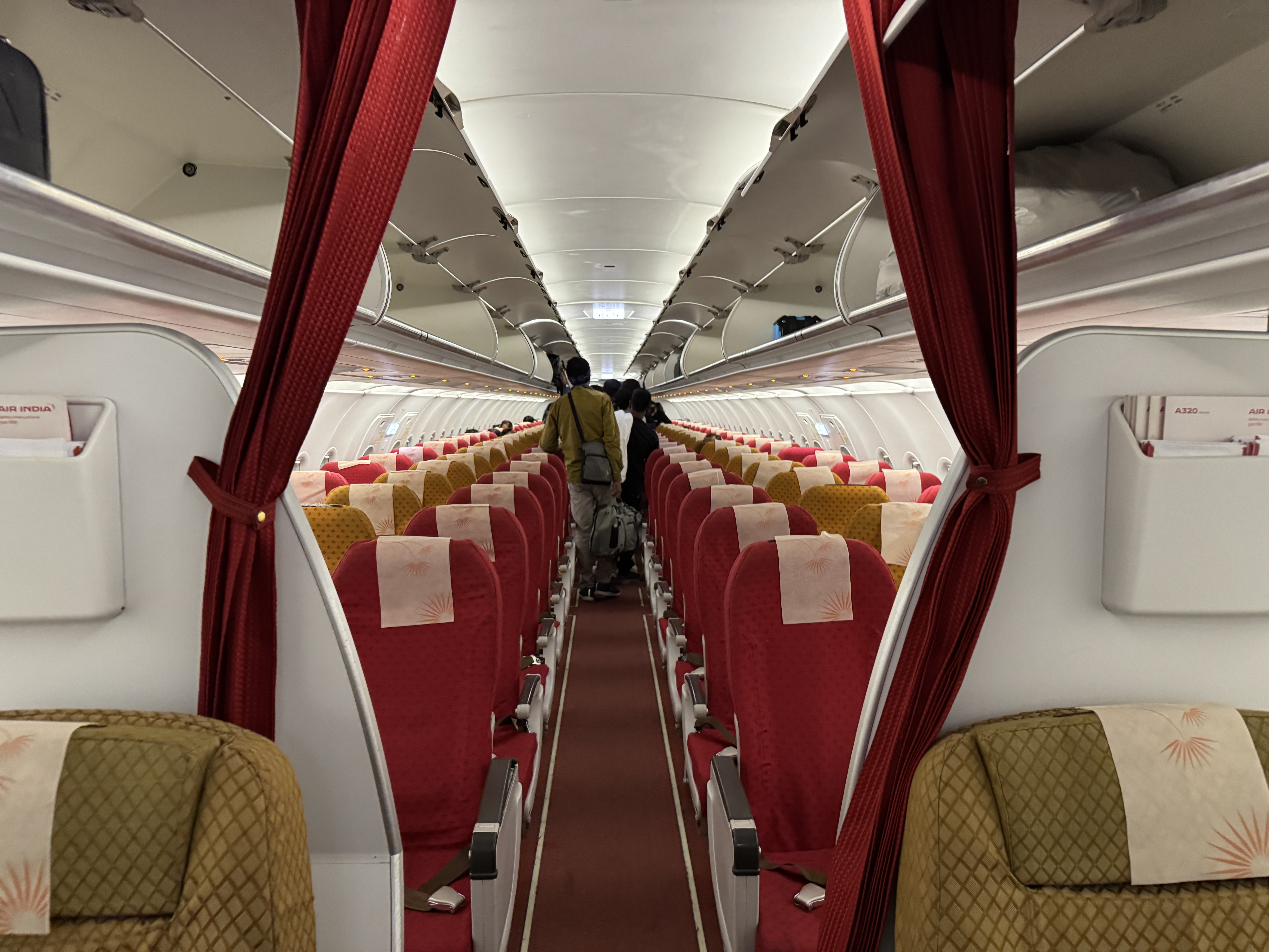 Air India A320 Economy DOH BOM entry from business Air India A320 Economy DOH BOM entry from business