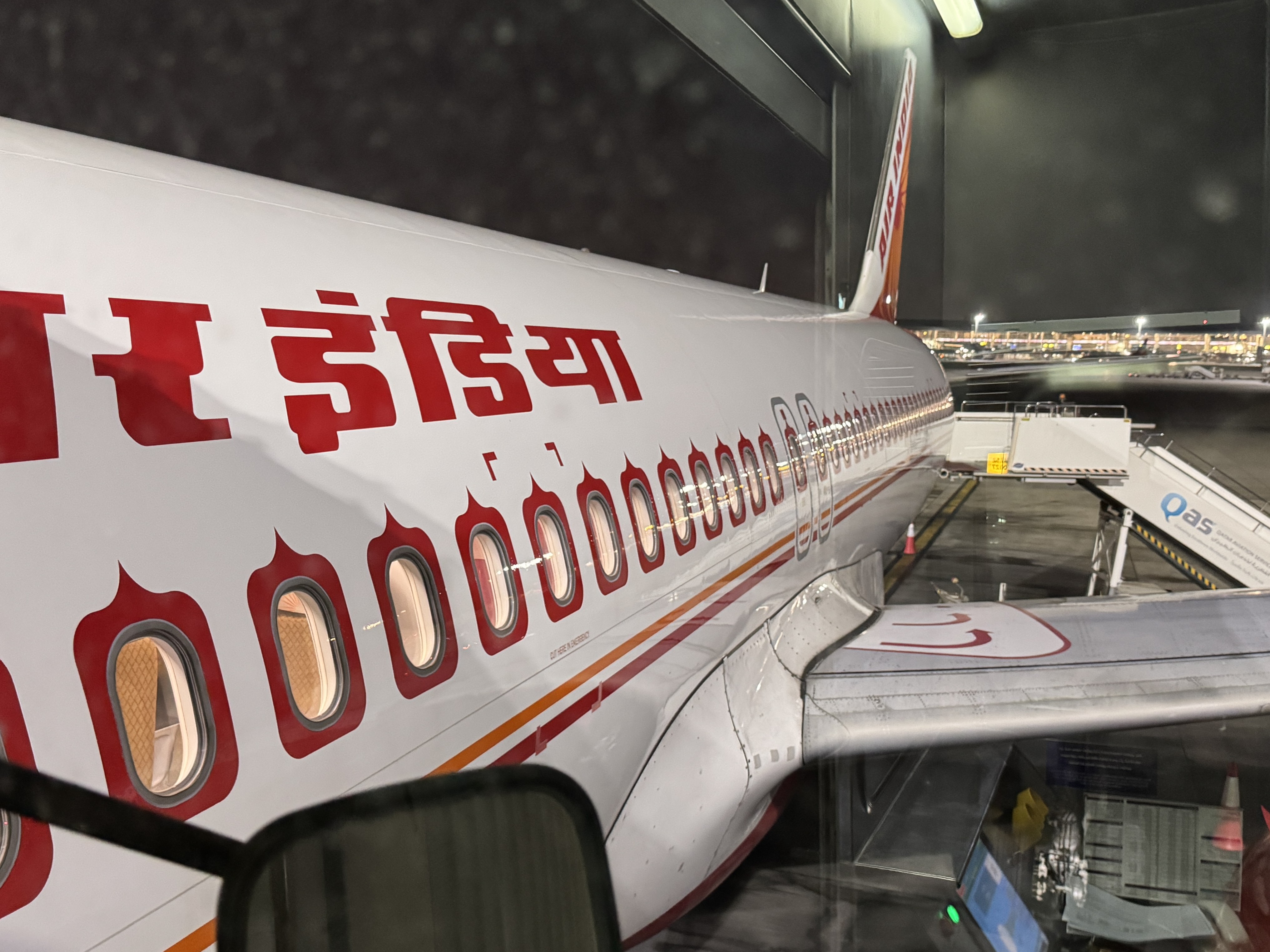 Air India A320 Economy DOH BOM plane from jetbridge Air India A320 Economy DOH BOM plane from jet bridge
