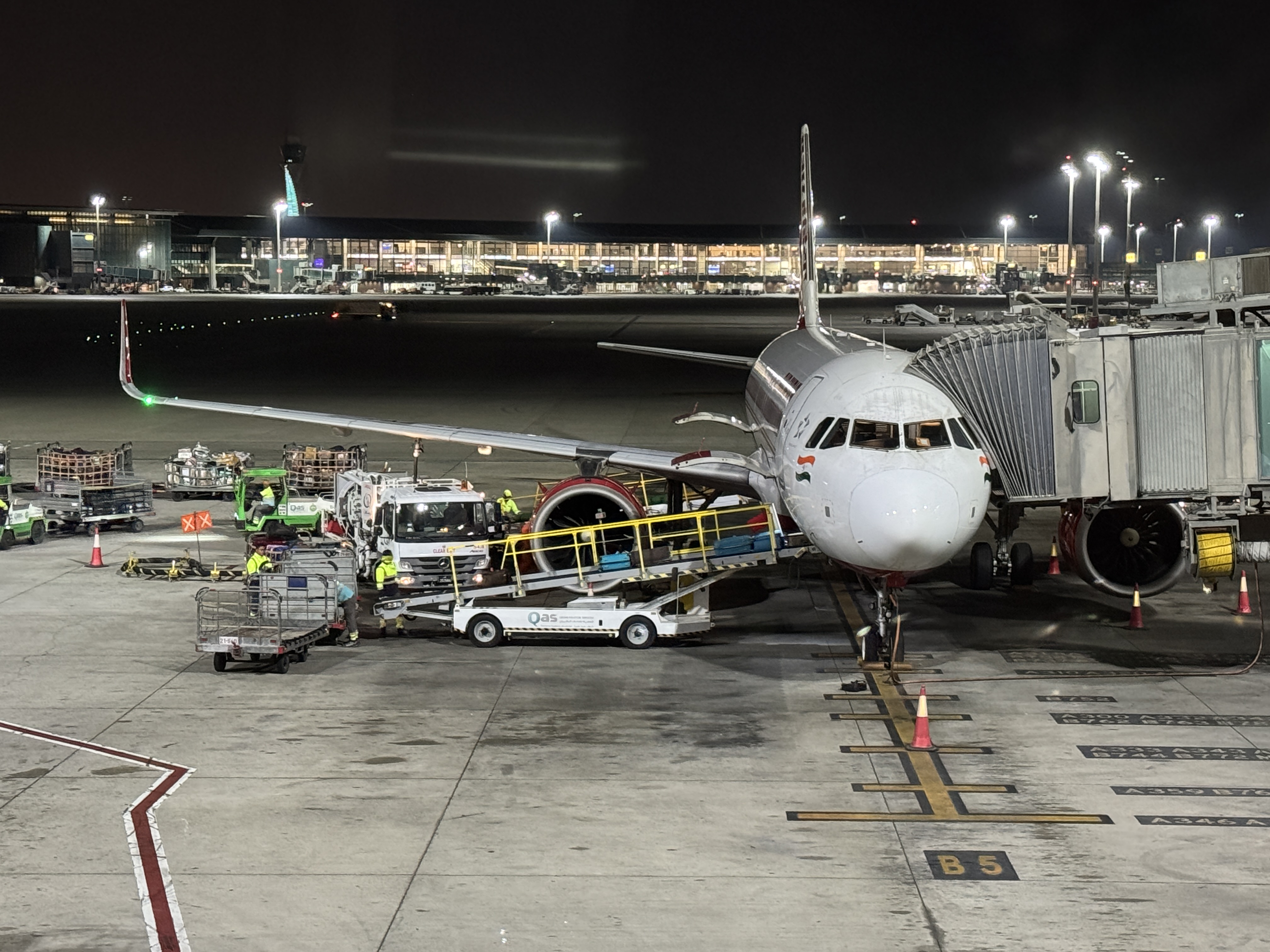 Air India A320 Economy DOH BOM plane from terminal Air India A320 Economy DOH BOM plane from terminal
