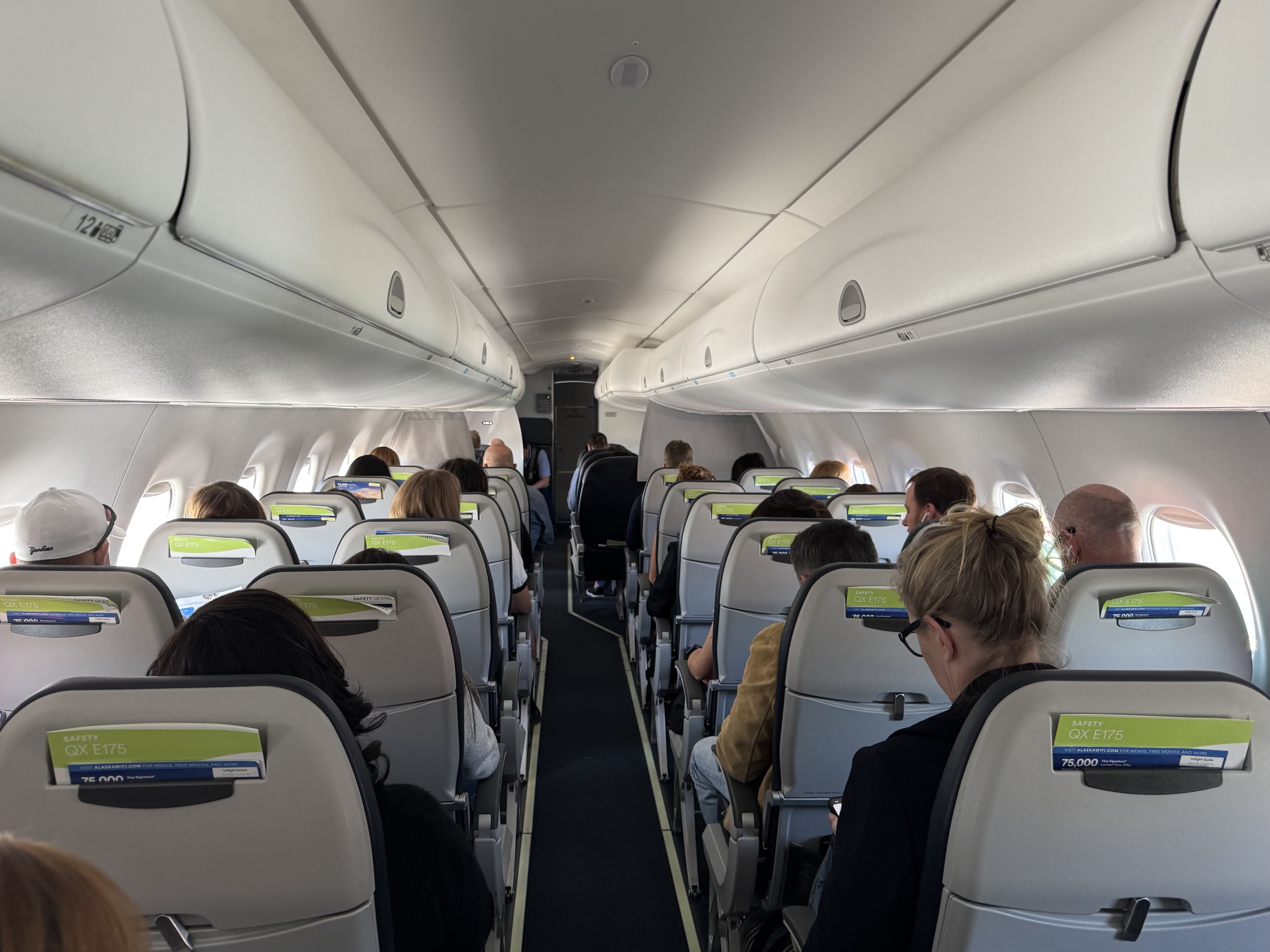 Alaska Airlines economy cabin aisle view on E175LR