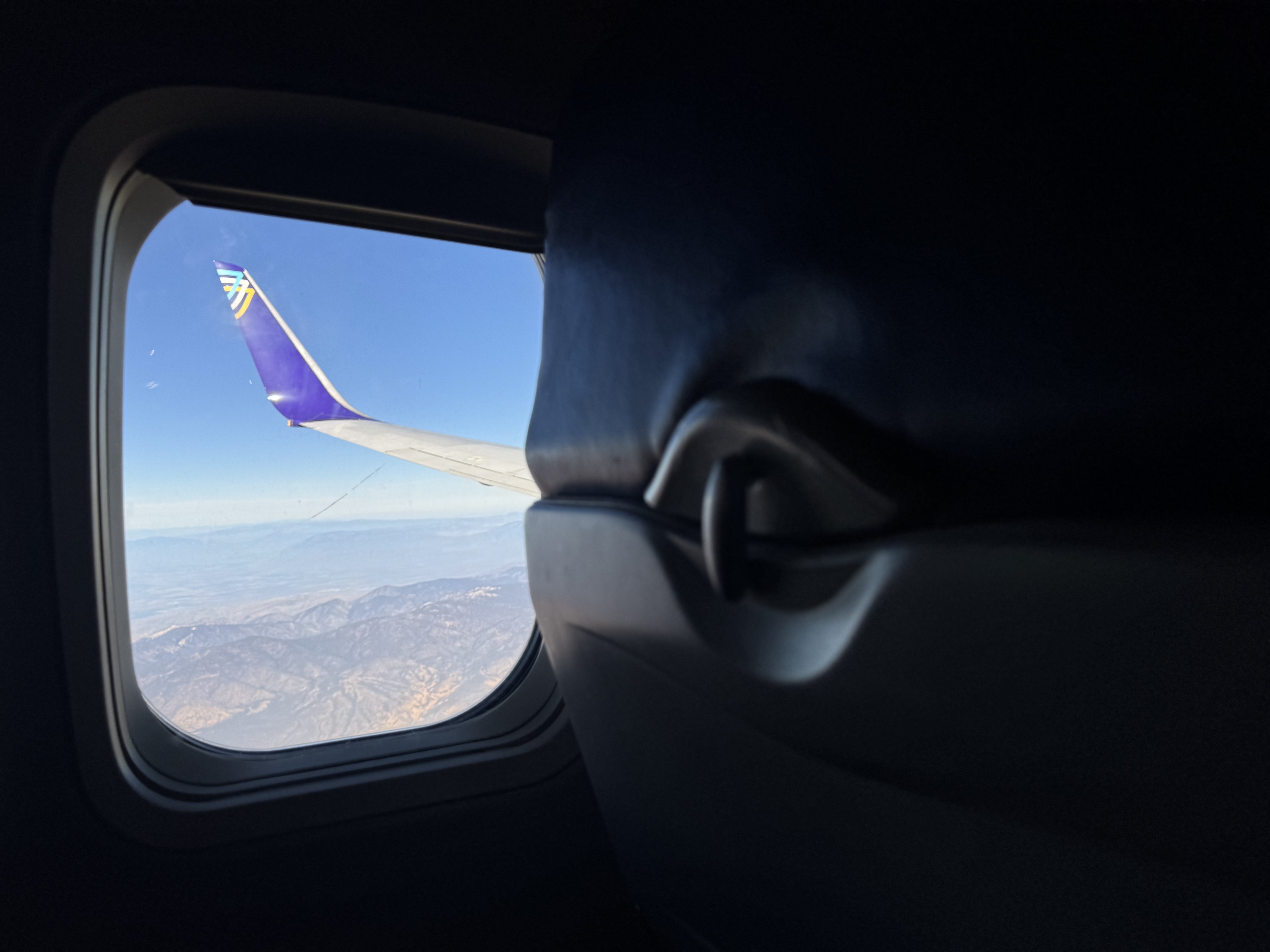 Avelo Airlines B737 7 wingtip seen from window Avelo Airlines B737 7 wingtip seen from window