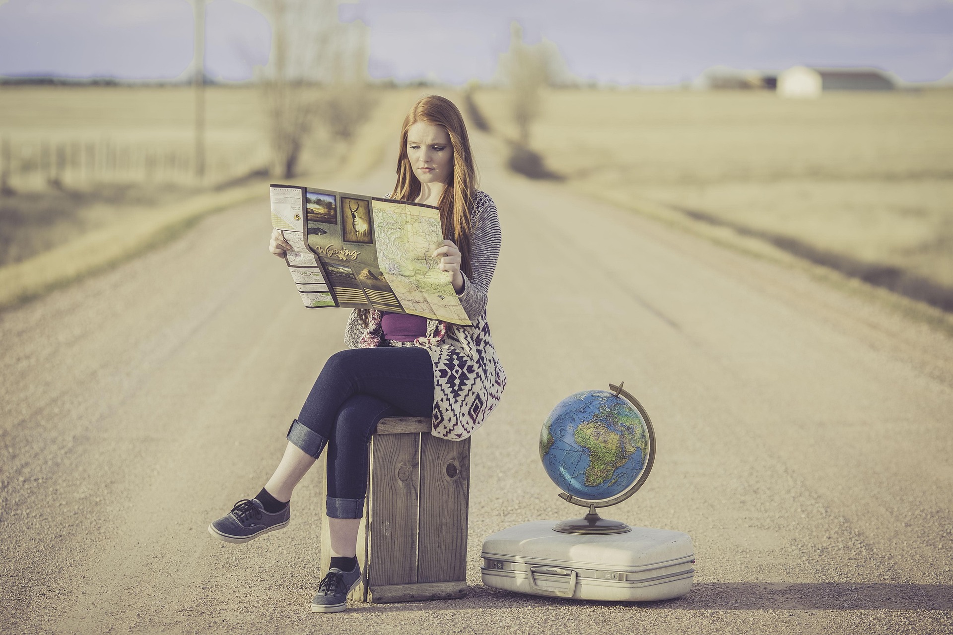 Girl with map in road Girl with map in road