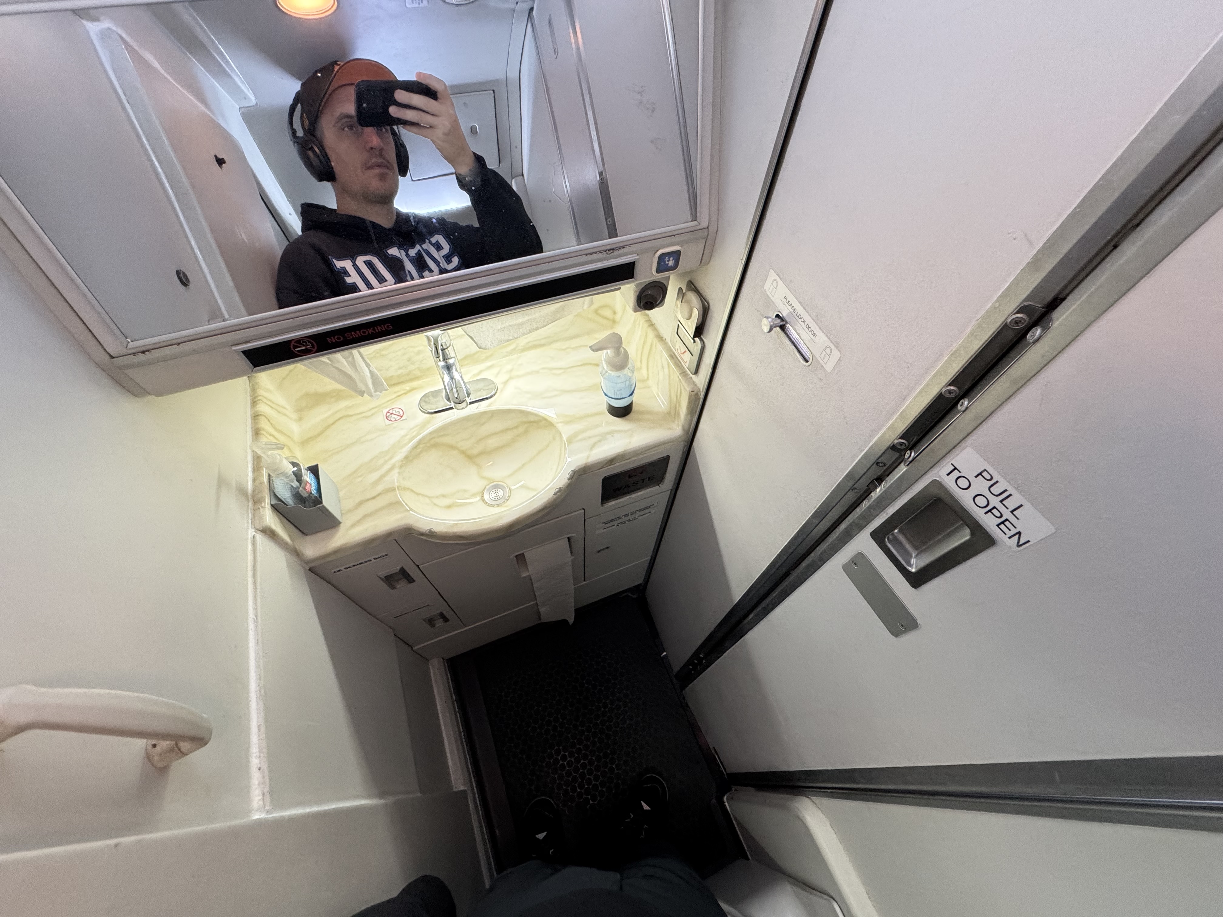 JSX Embraer ERJ135 lavatory selfie JSX Embraer ERJ135 lavatory selfie