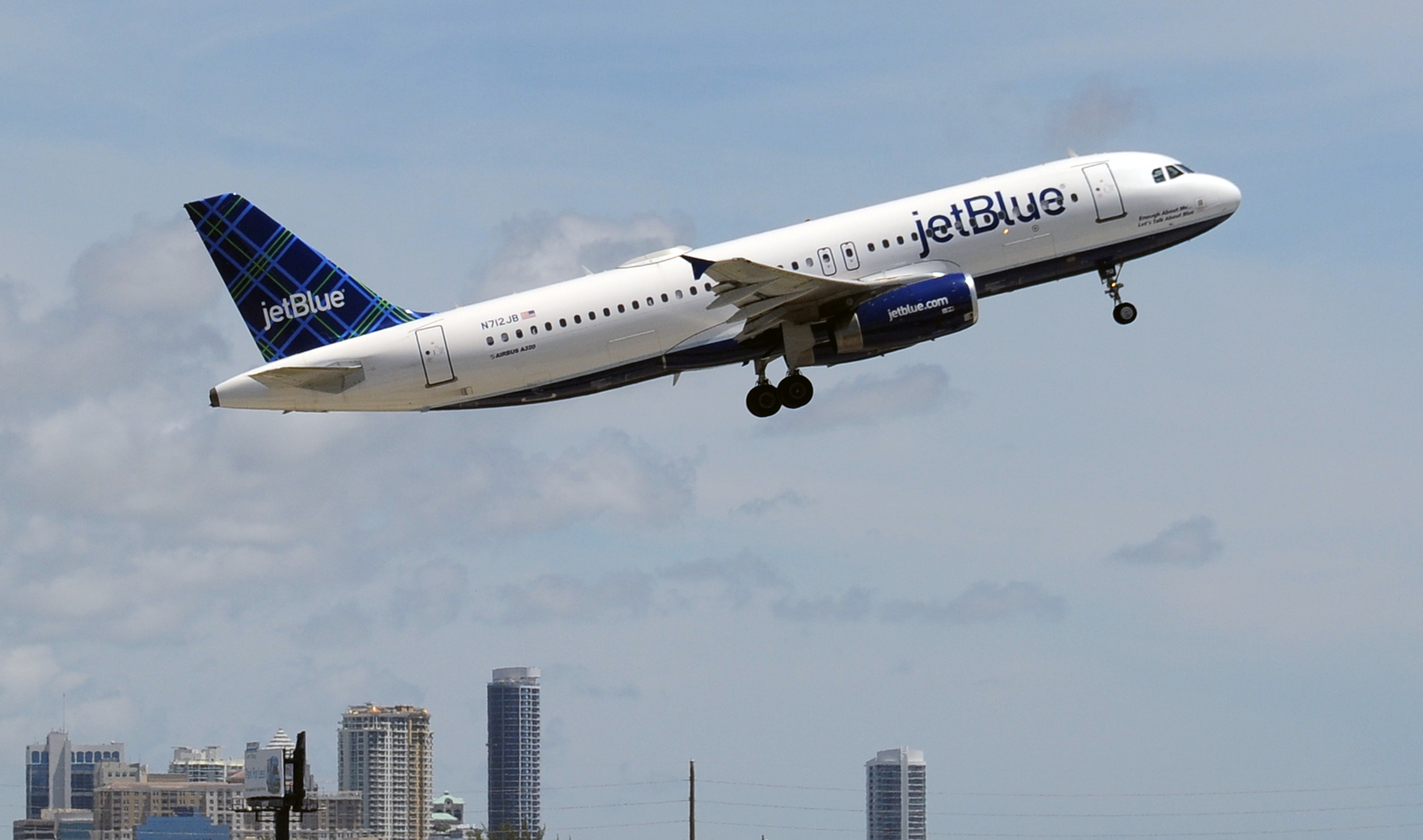 a JetBlue A320 taking off