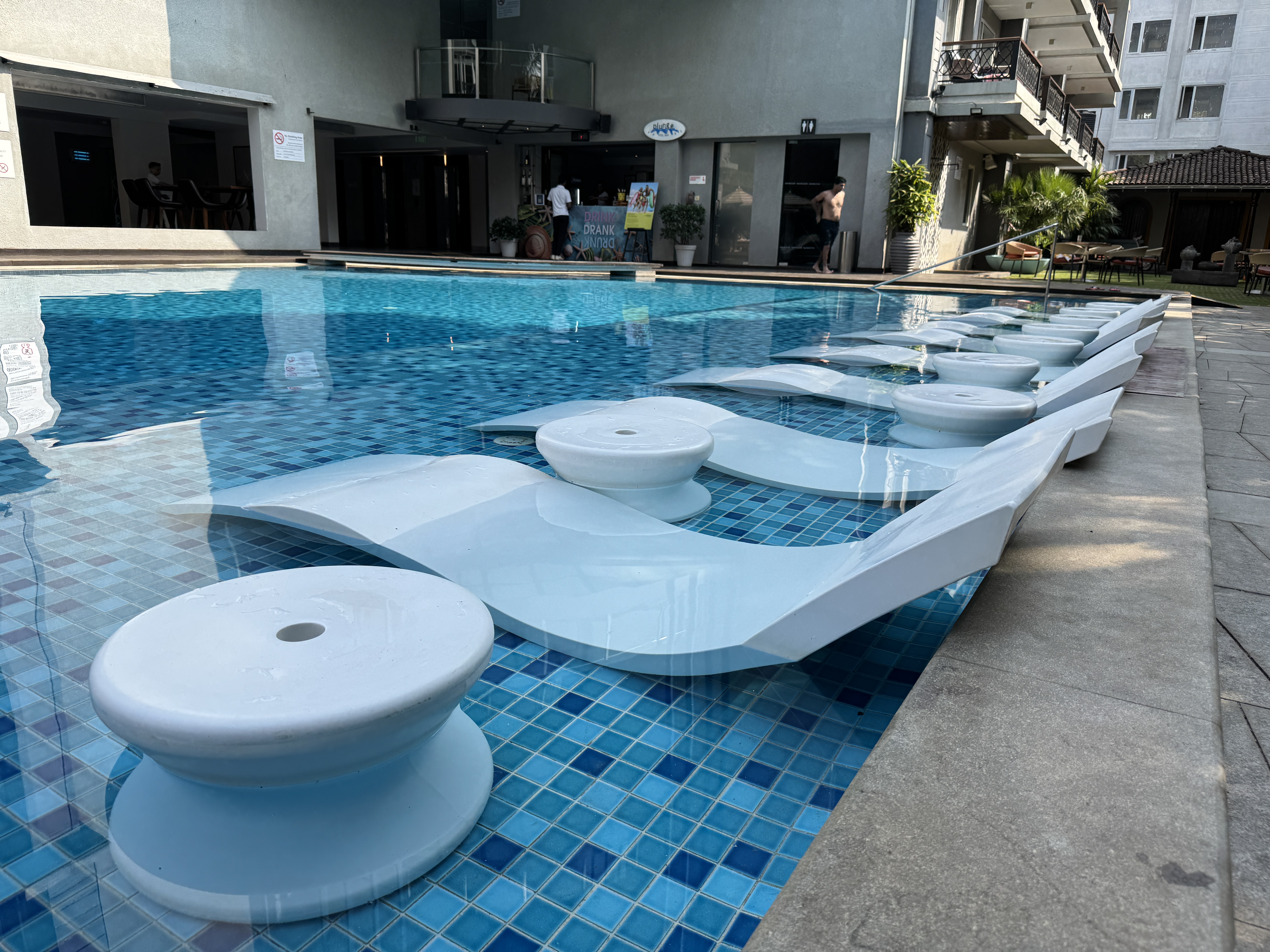 Le Meridien Goa Calangute pool loungers Le Meridien Goa Calangute pool loungers