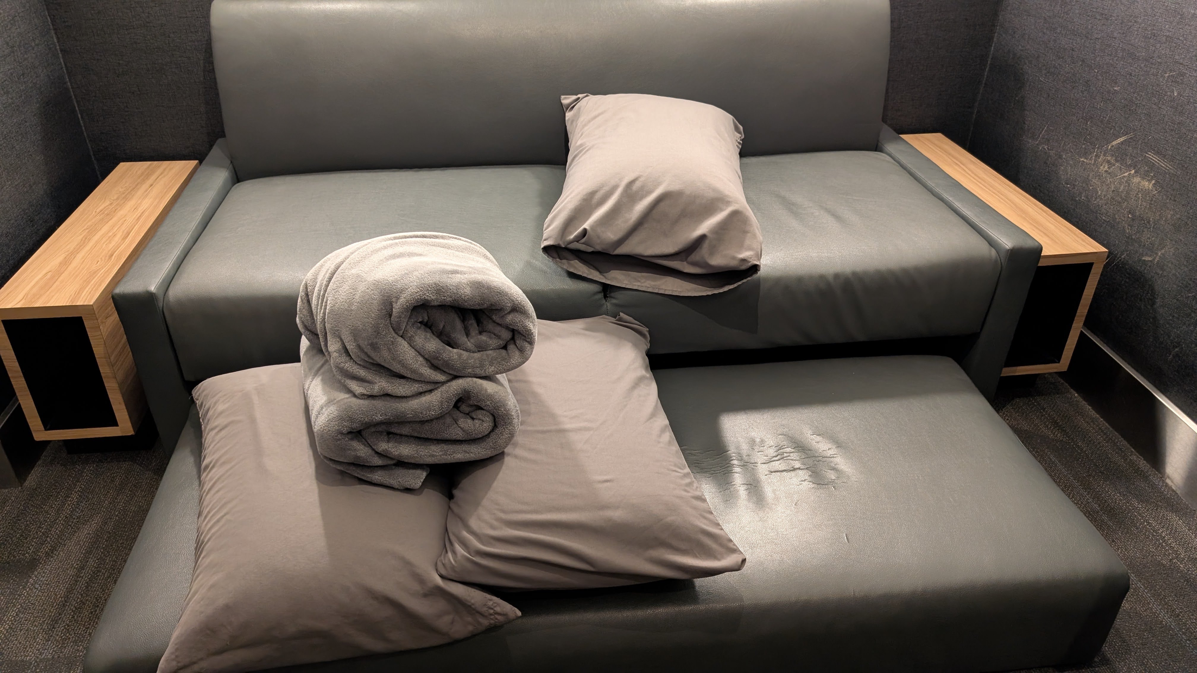 Minute Suites Terminal C IAH trundle sofa with bedding Minute Suites Terminal C IAH trundle sofa with bedding