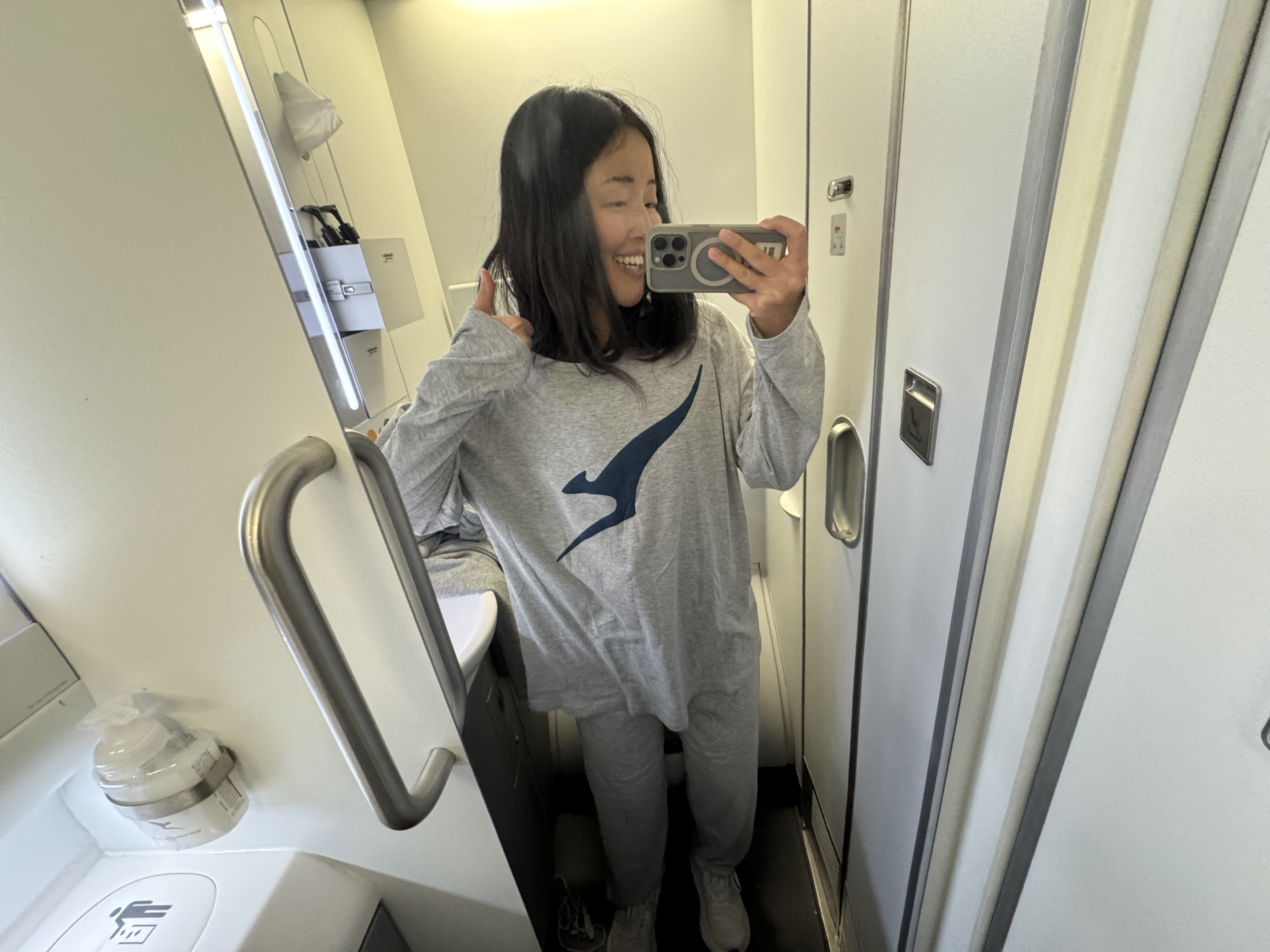 Qantas Business Class Changing into Pajamas