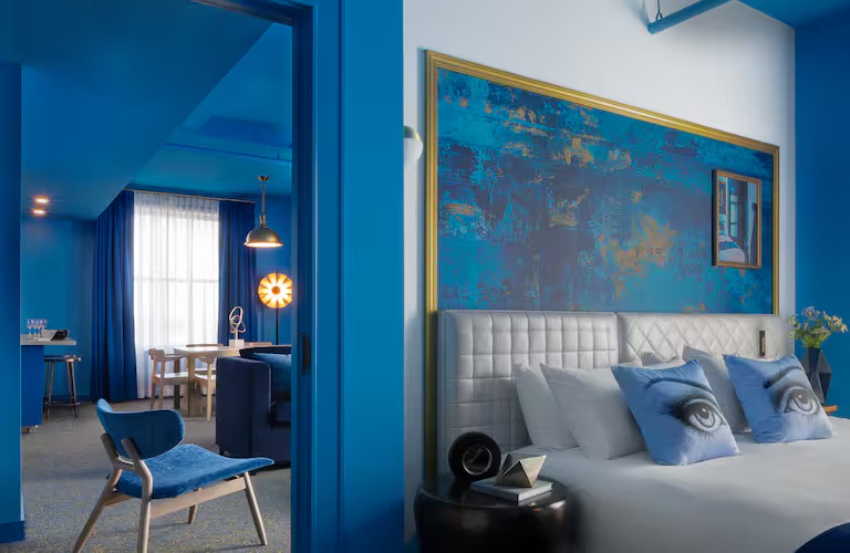 Angad Arts Hotel grand suite 1 bed bedroom blue Angad Arts Hotel grand suite 1 bed bedroom blue
