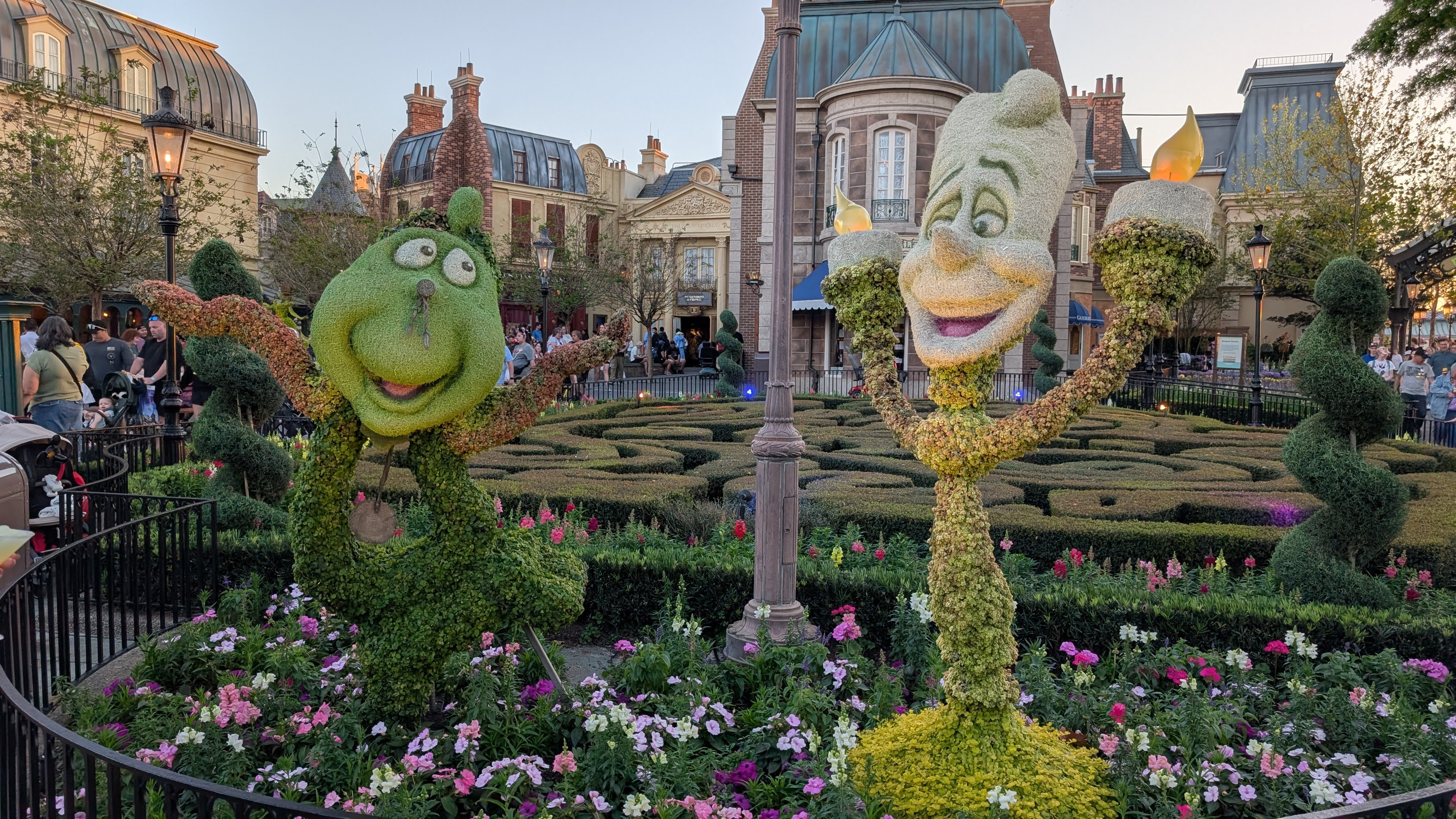 Epcot Flower and Garden Festival Cogsworth and Lumiere topiaries Epcot Flower and Garden Festival Cogsworth and Lumiere topiaries