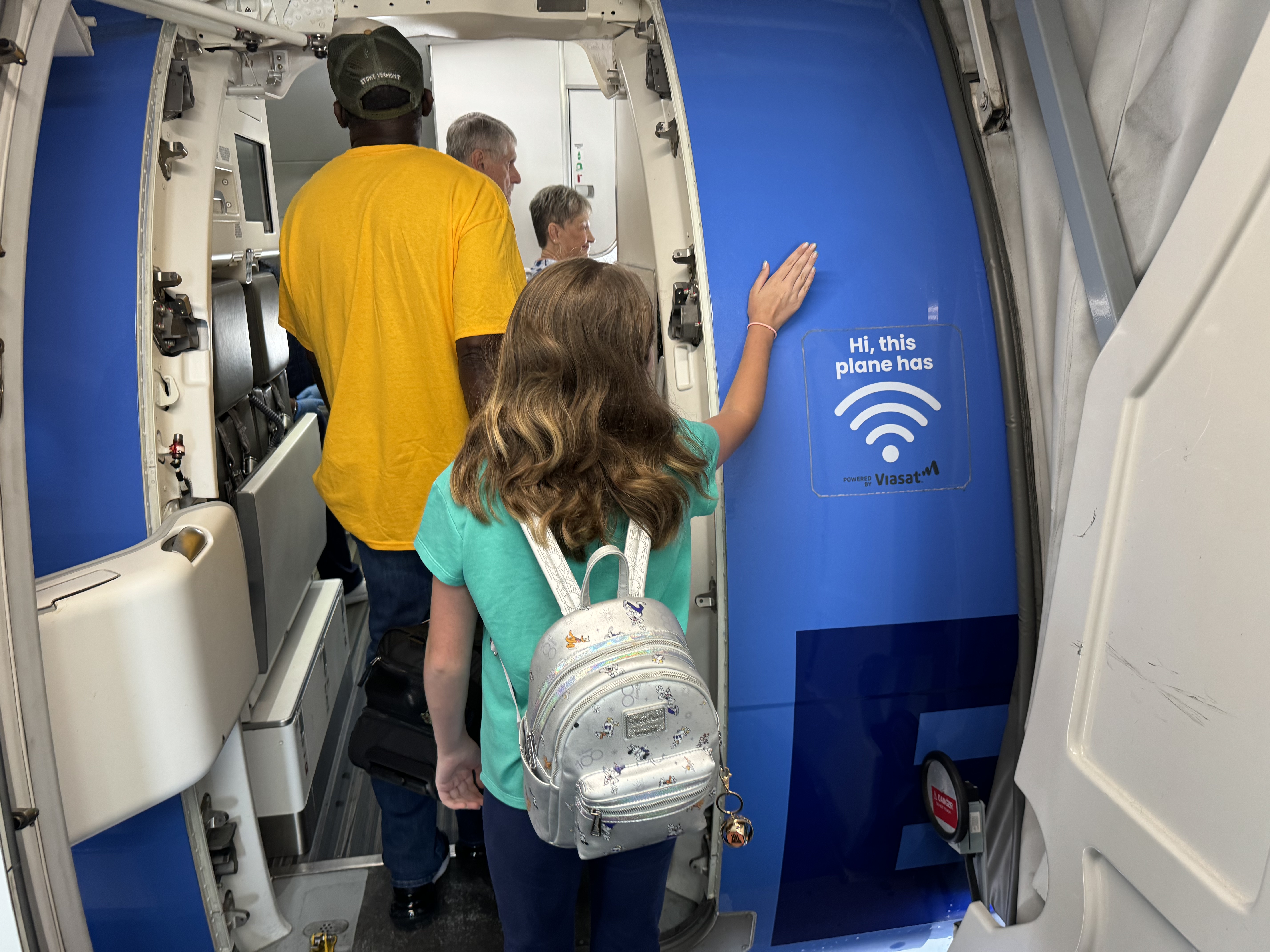 Girl tapping Breeze plane