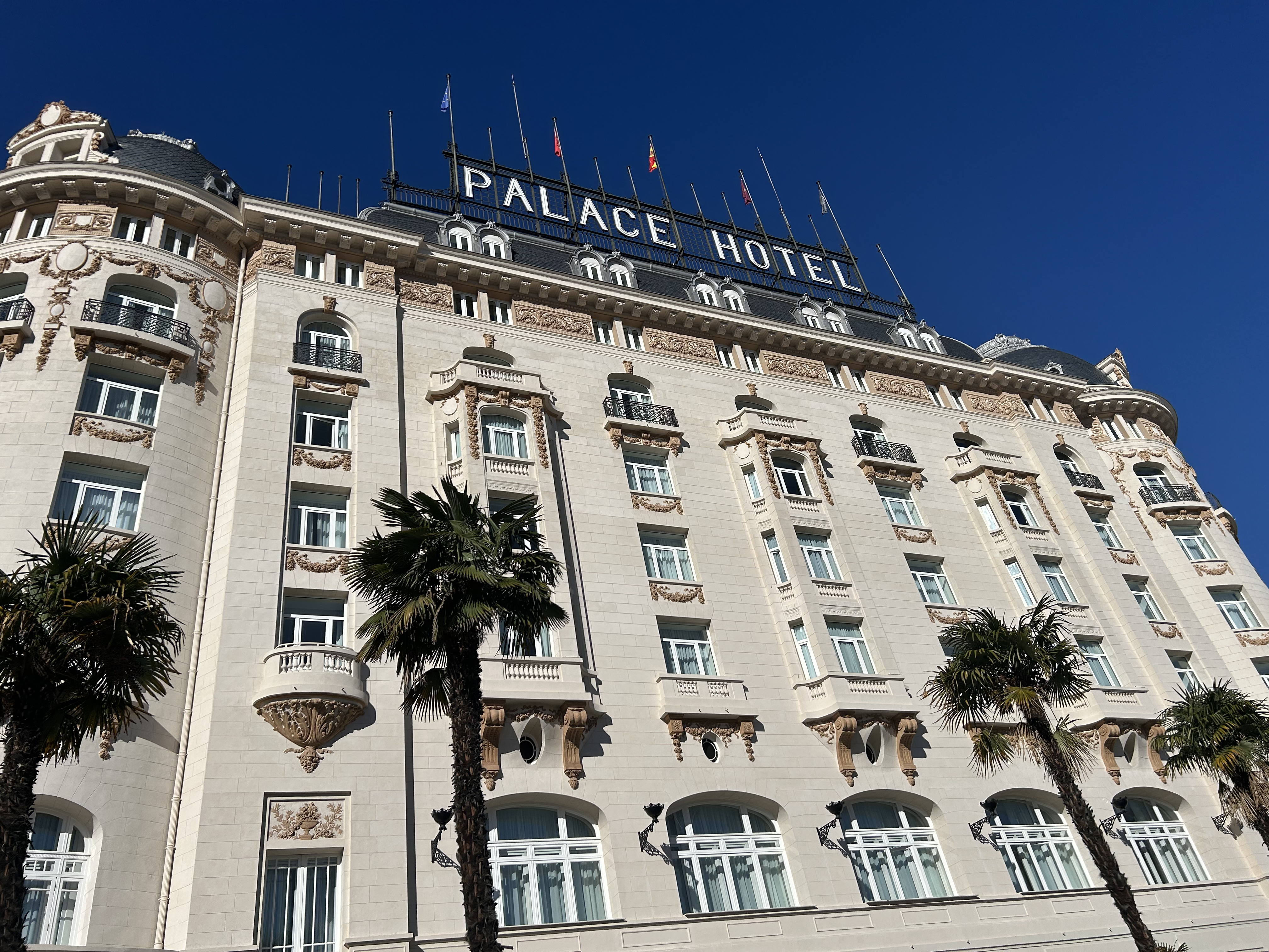 The Palace, a Luxury Collection Hotel, Madrid, front view with palm trees