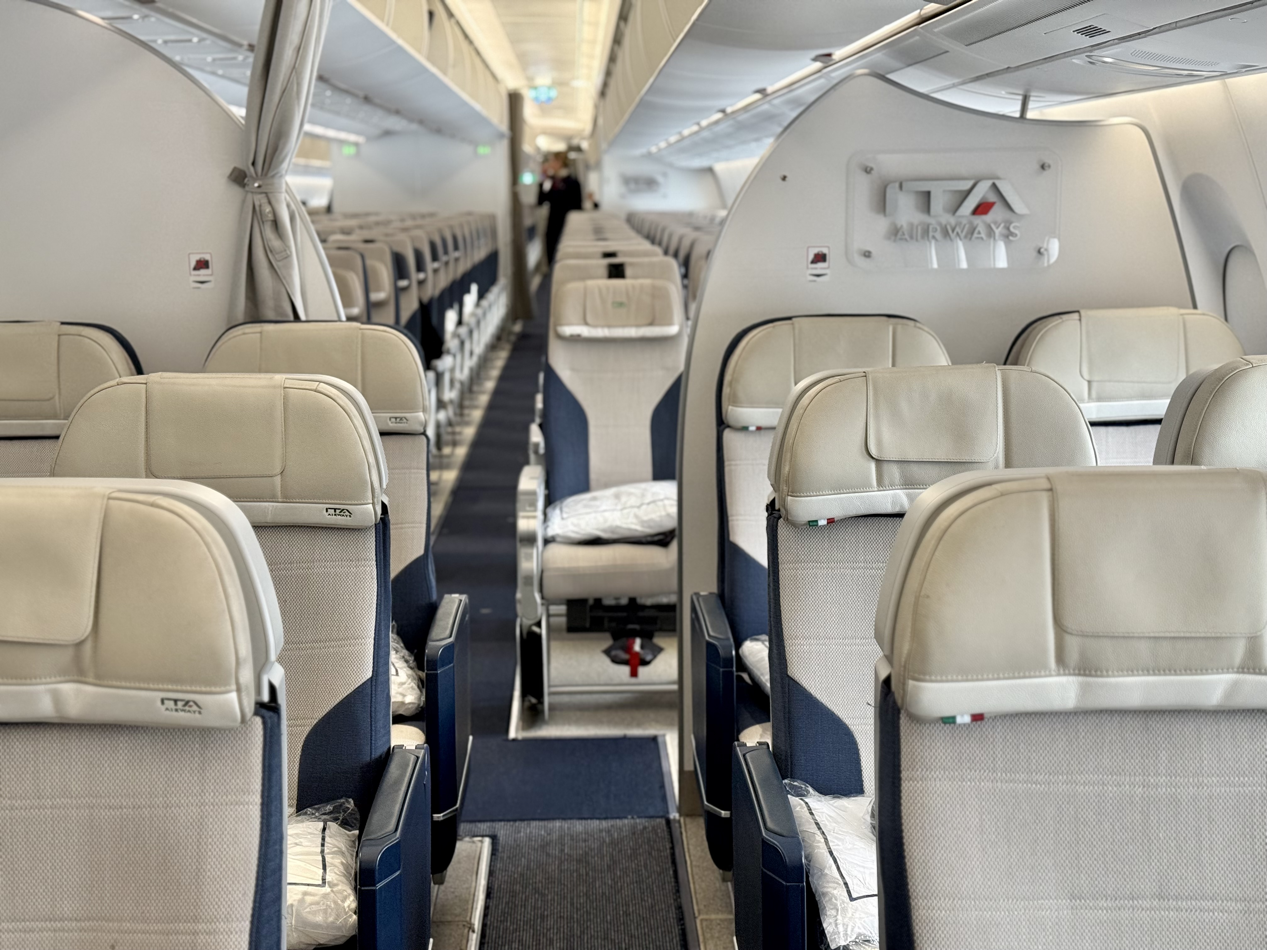 ITA Airways Airbus A350 premium economy cabin into economy cabin