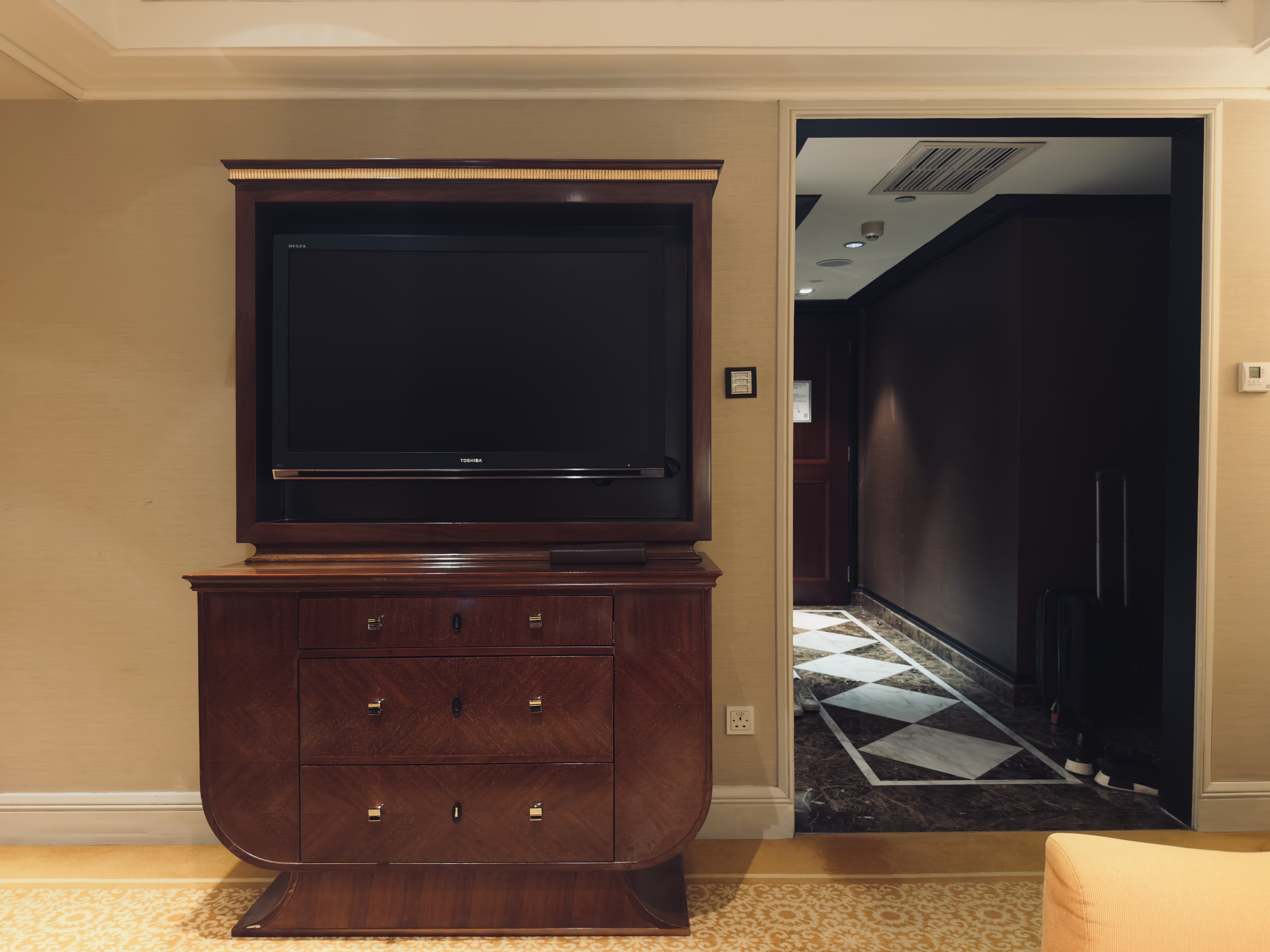 The St. Regis Beijing living room tv and foyer