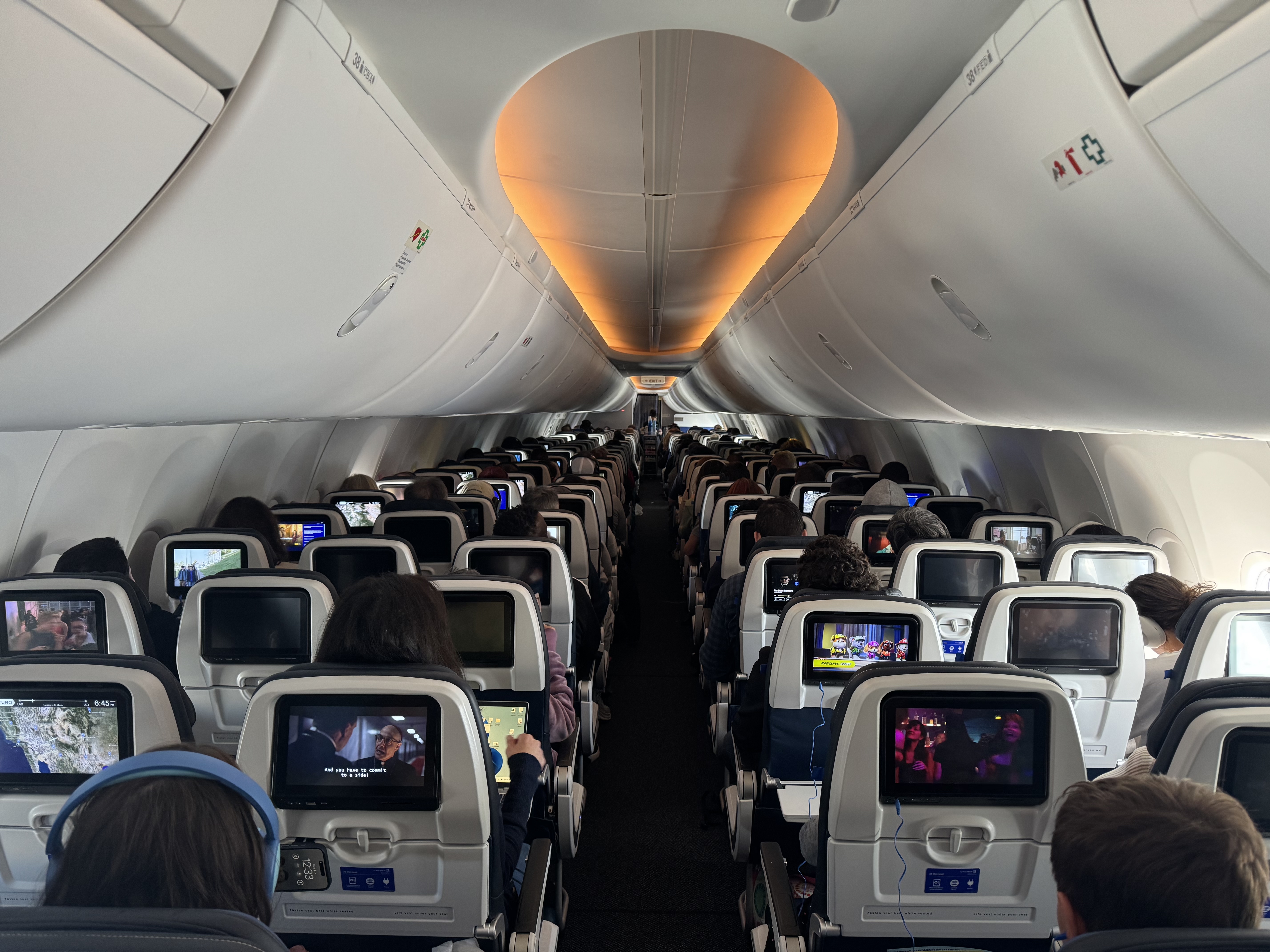 United Airlines B737 MAX9 view up the aisle in economy