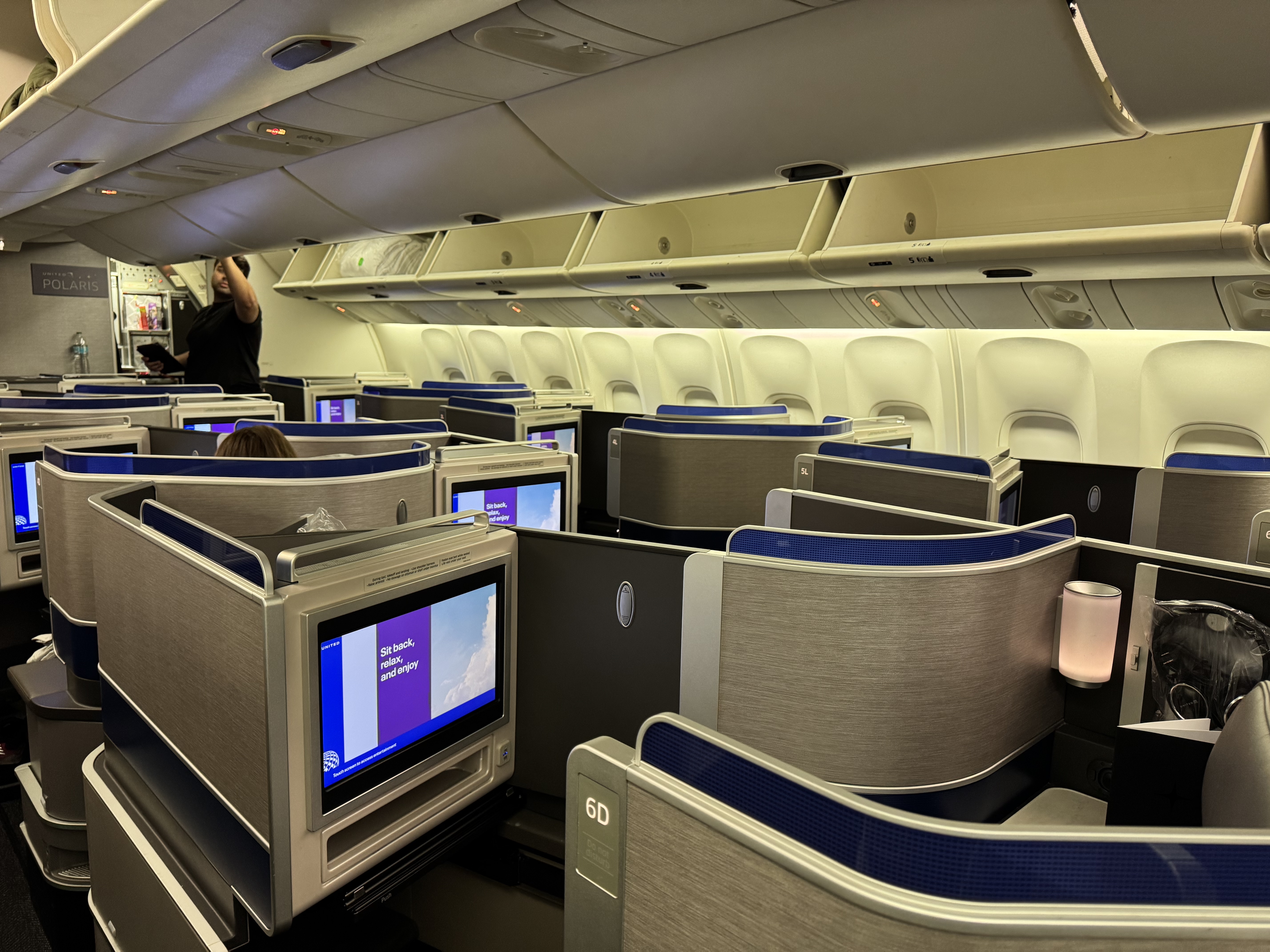 United Airlines B767 400 Polaris center seats overhead