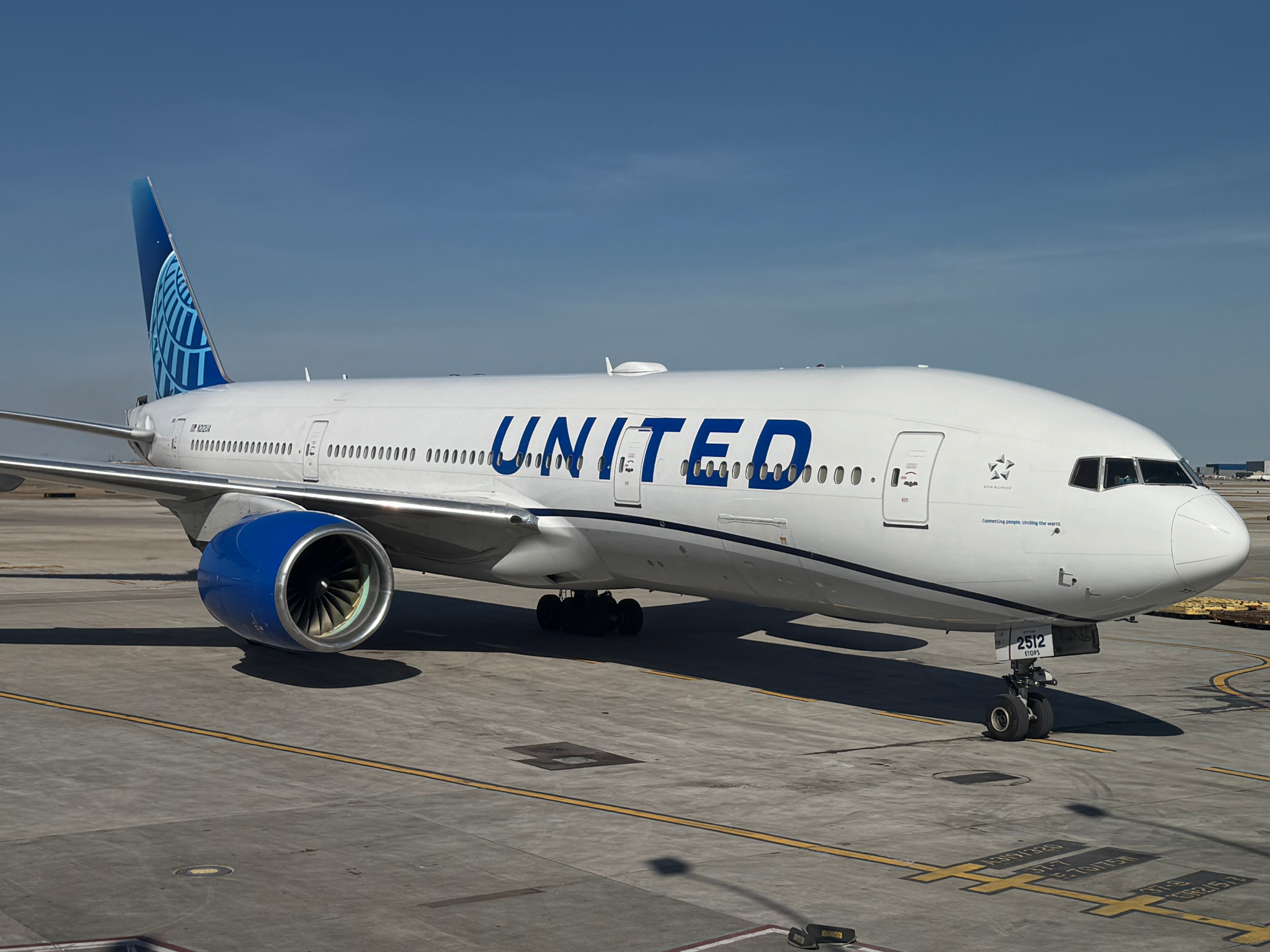 United Airlines B777 200 plane taxiing at Chicago ORD United Airlines B777 200 plane taxiing at Chicago ORD