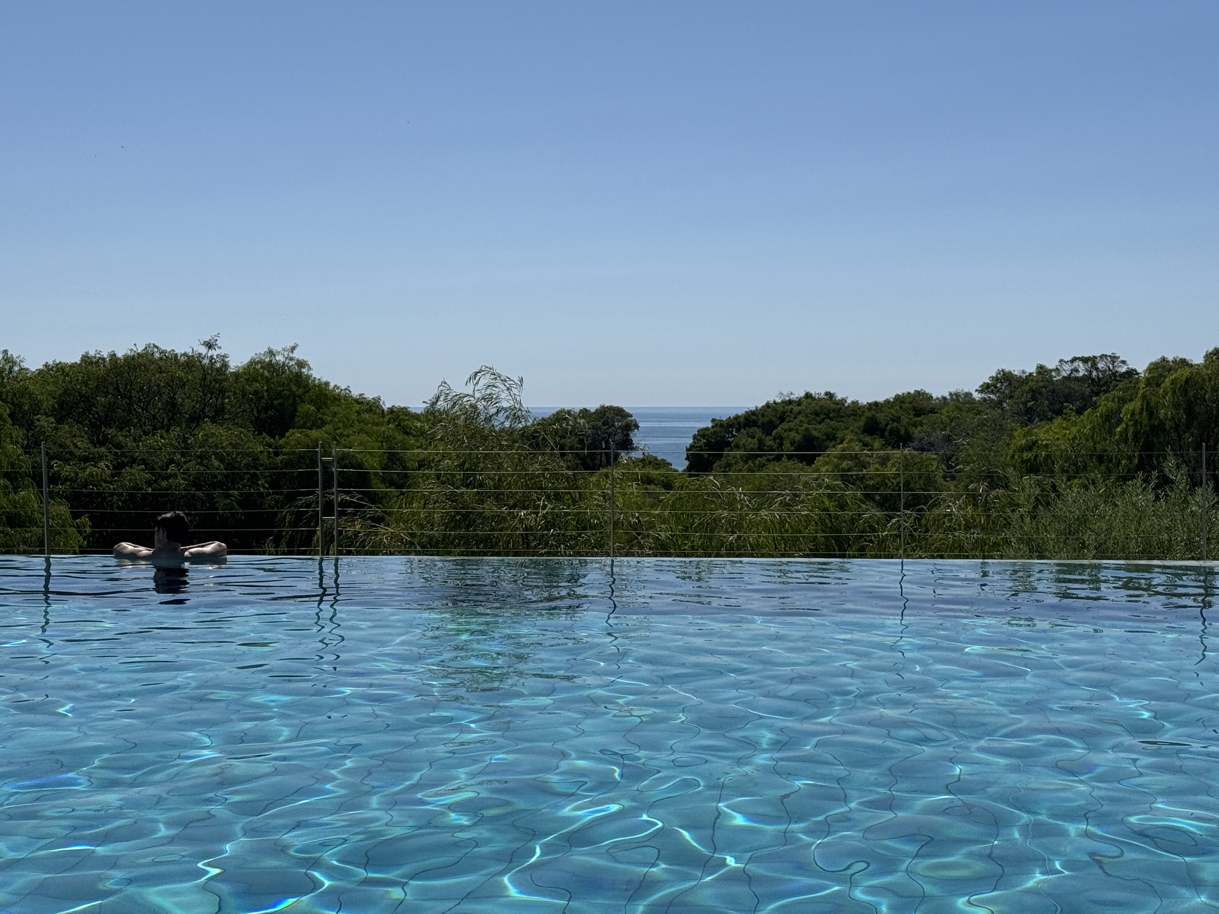 Pullman Bunker Bay Resort pool with ocean Pullman Bunker Bay Resort pool with ocean