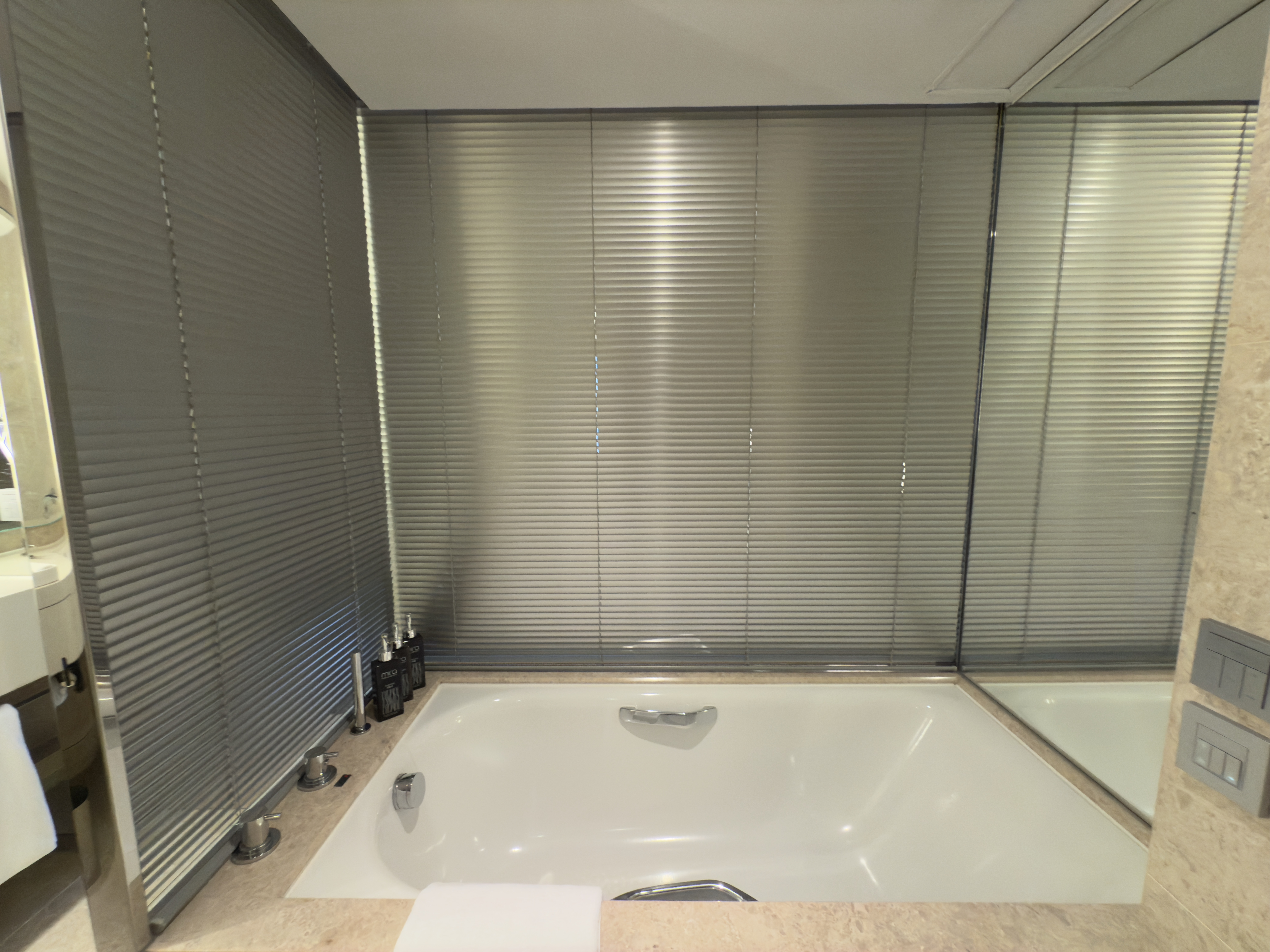 The Mira Hong Kong bathroom privacy blinds