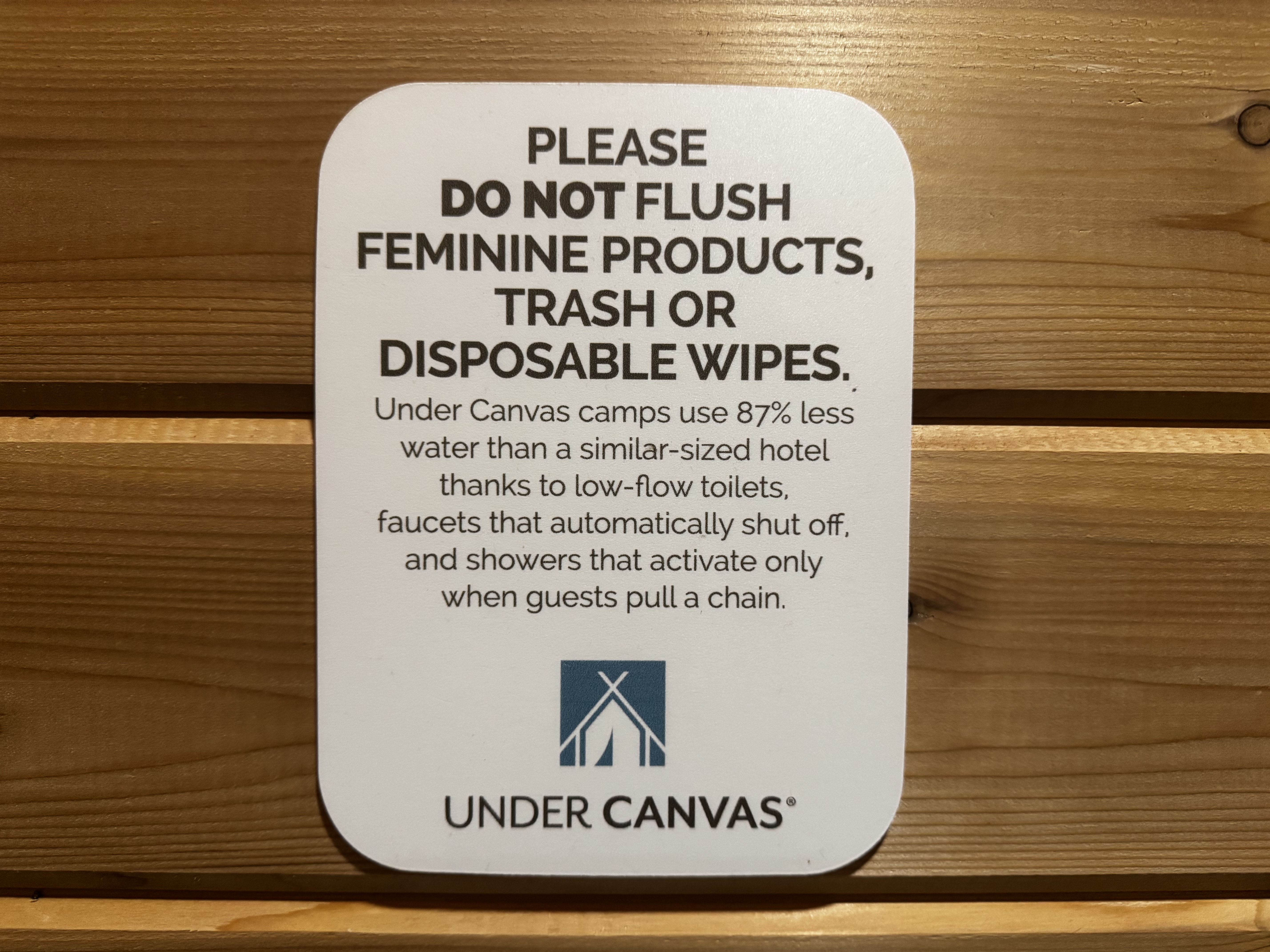 Under Canvas Moab bathroom sign